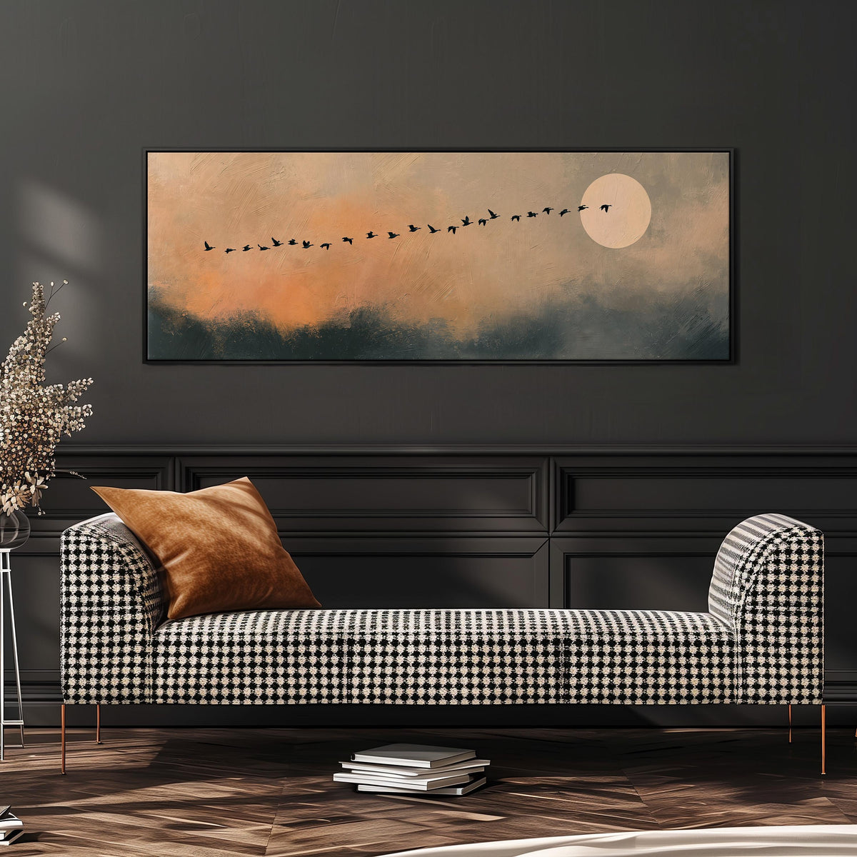 Migrating birds passing a moon at peach dusk wide panoramic canvas print above a bench in a dark living room