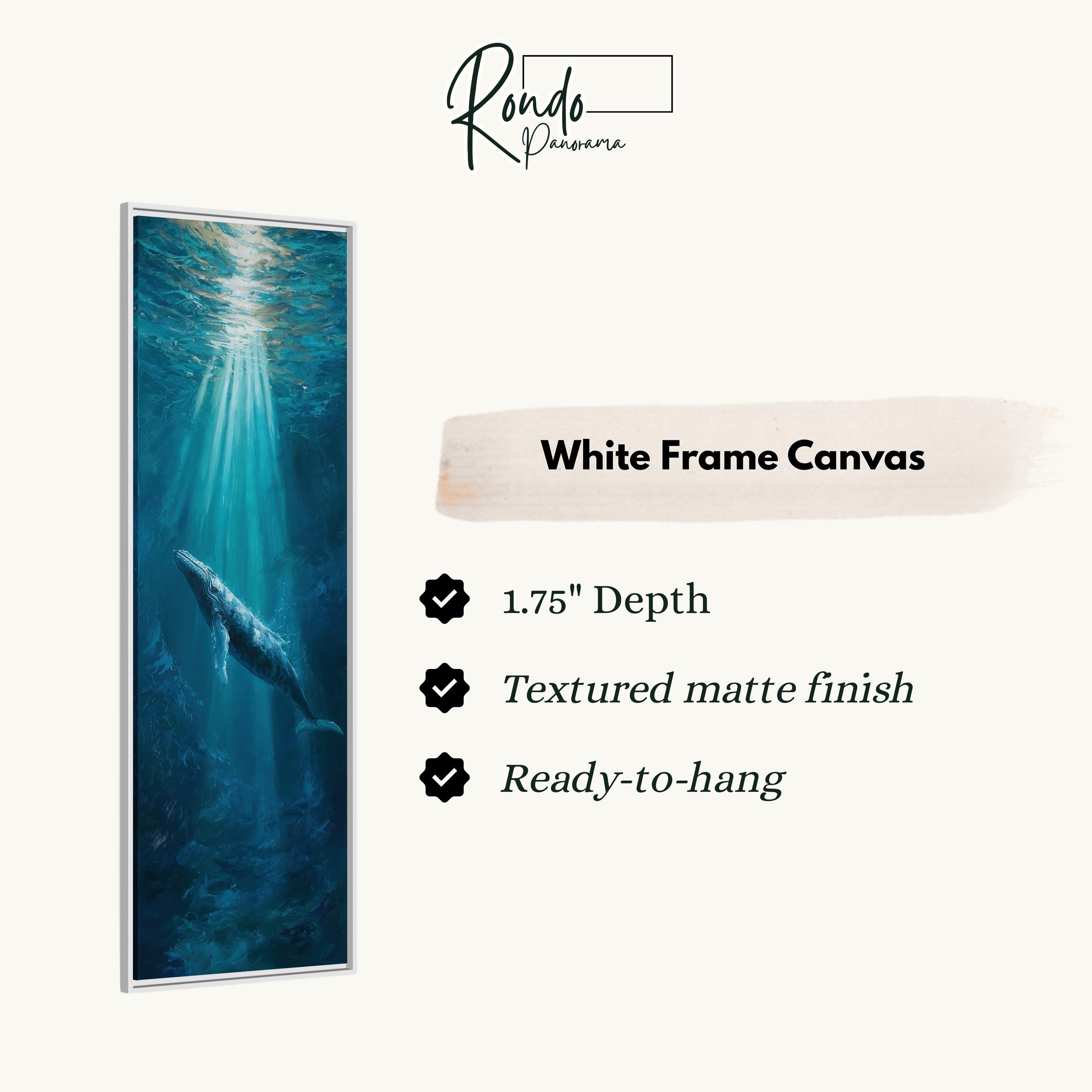 The image is a framed painting of a whale swimming in the ocean, with a white frame.