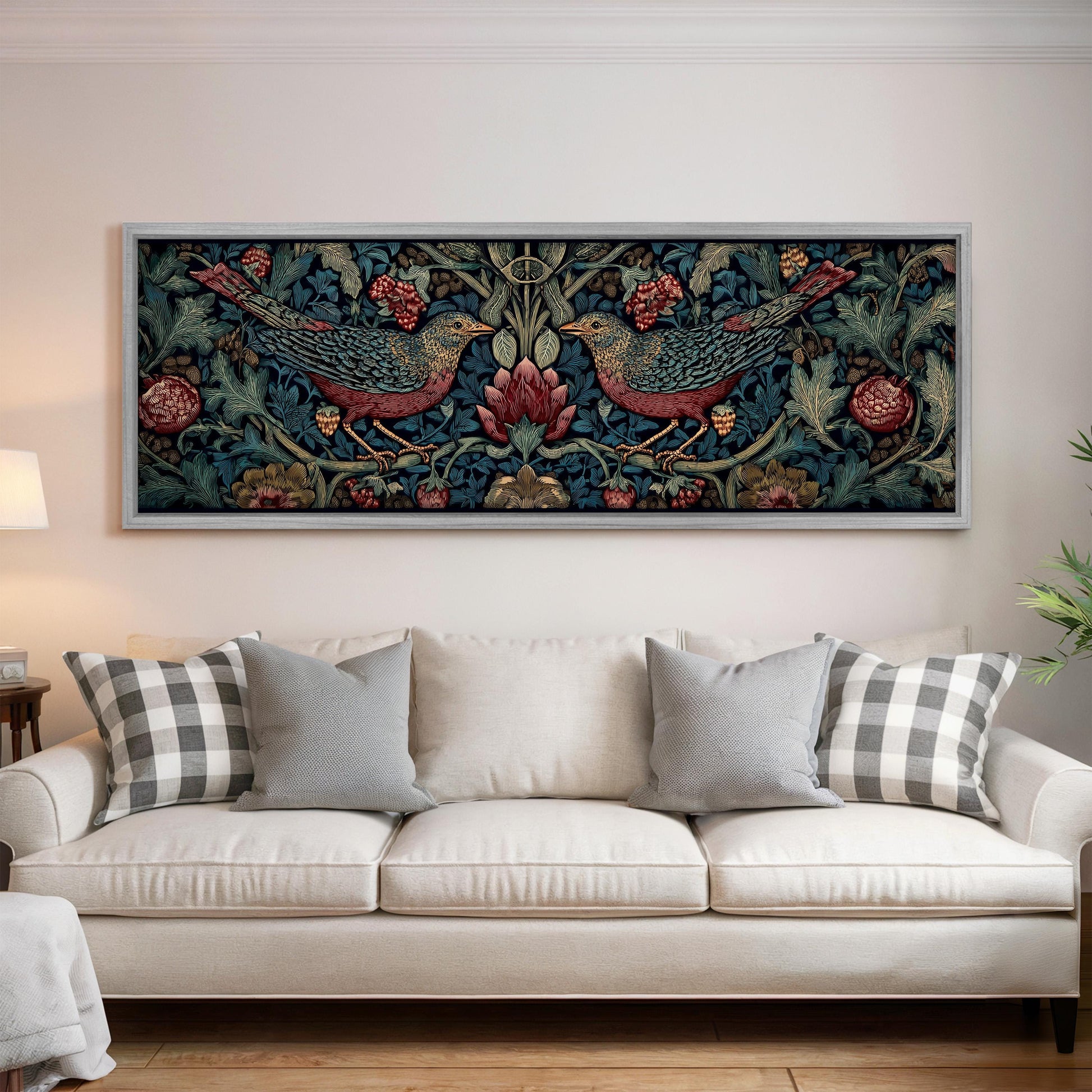 a large, ornate, and colorful tapestry or painting hanging on a wall above a white sofa with decorative pillows.