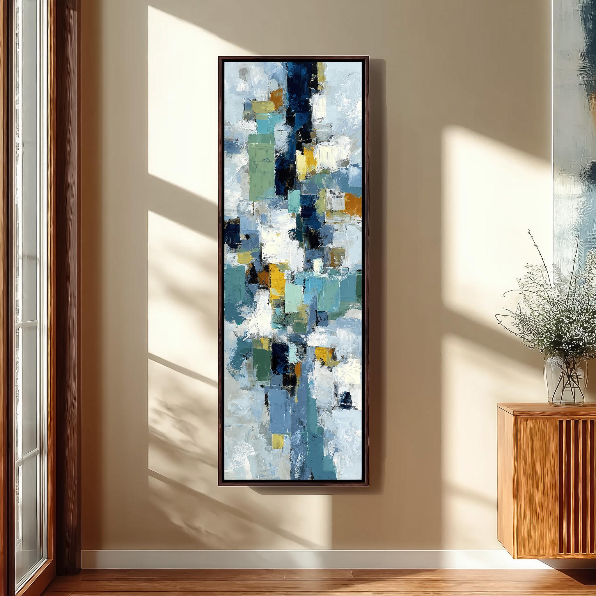 a large abstract painting hanging on a wall in a room with a wooden floor and a window.
