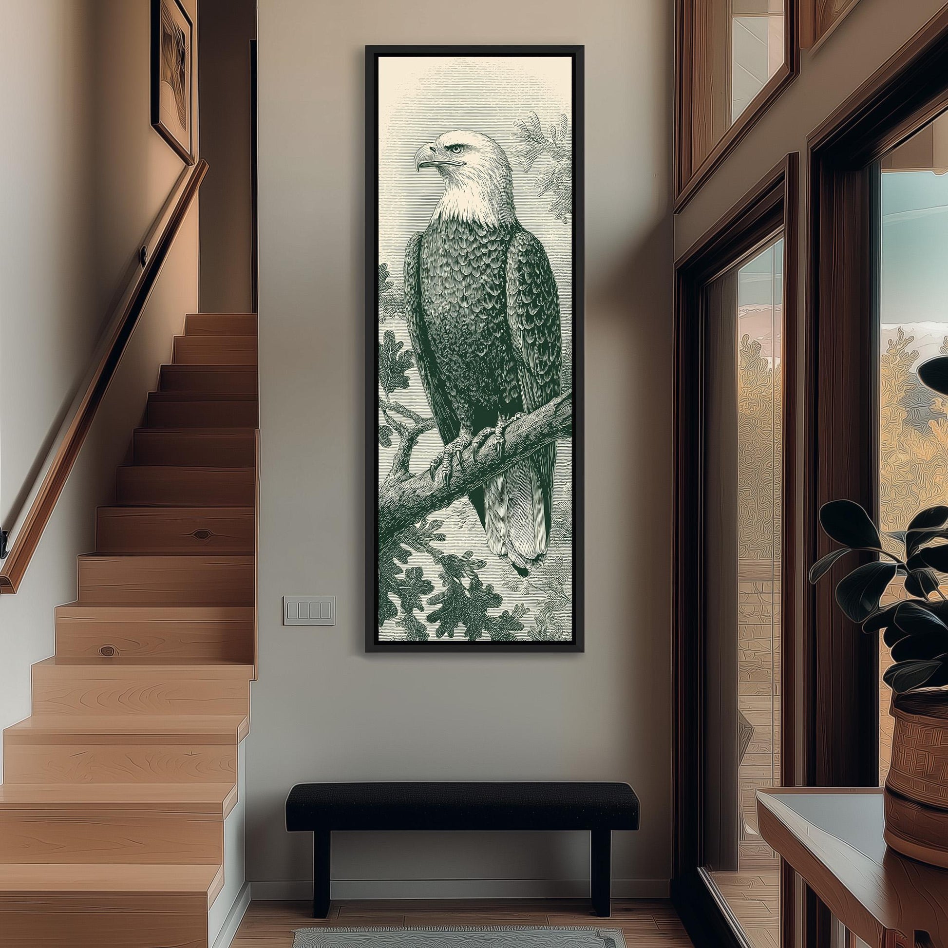 a large framed picture of a bald eagle perched on a branch, hanging on the wall in a hallway.