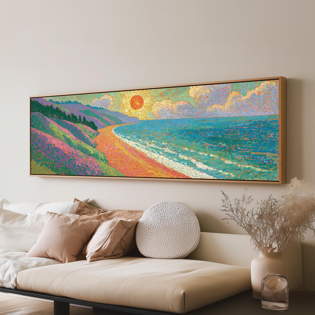 Coastal cliffs at sunset long horizontal canvas print above a sofa in a living room