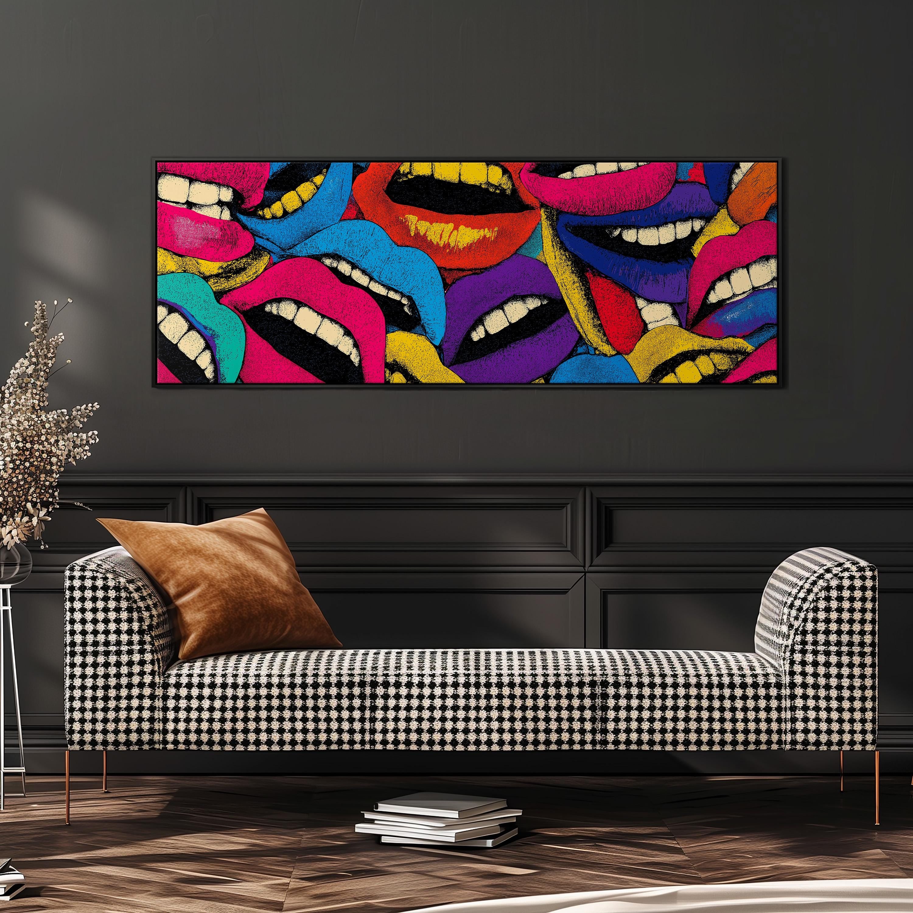 a modern living room with a checkered sofa, a stack of books, and a large abstract painting of colorful lips on the wall.