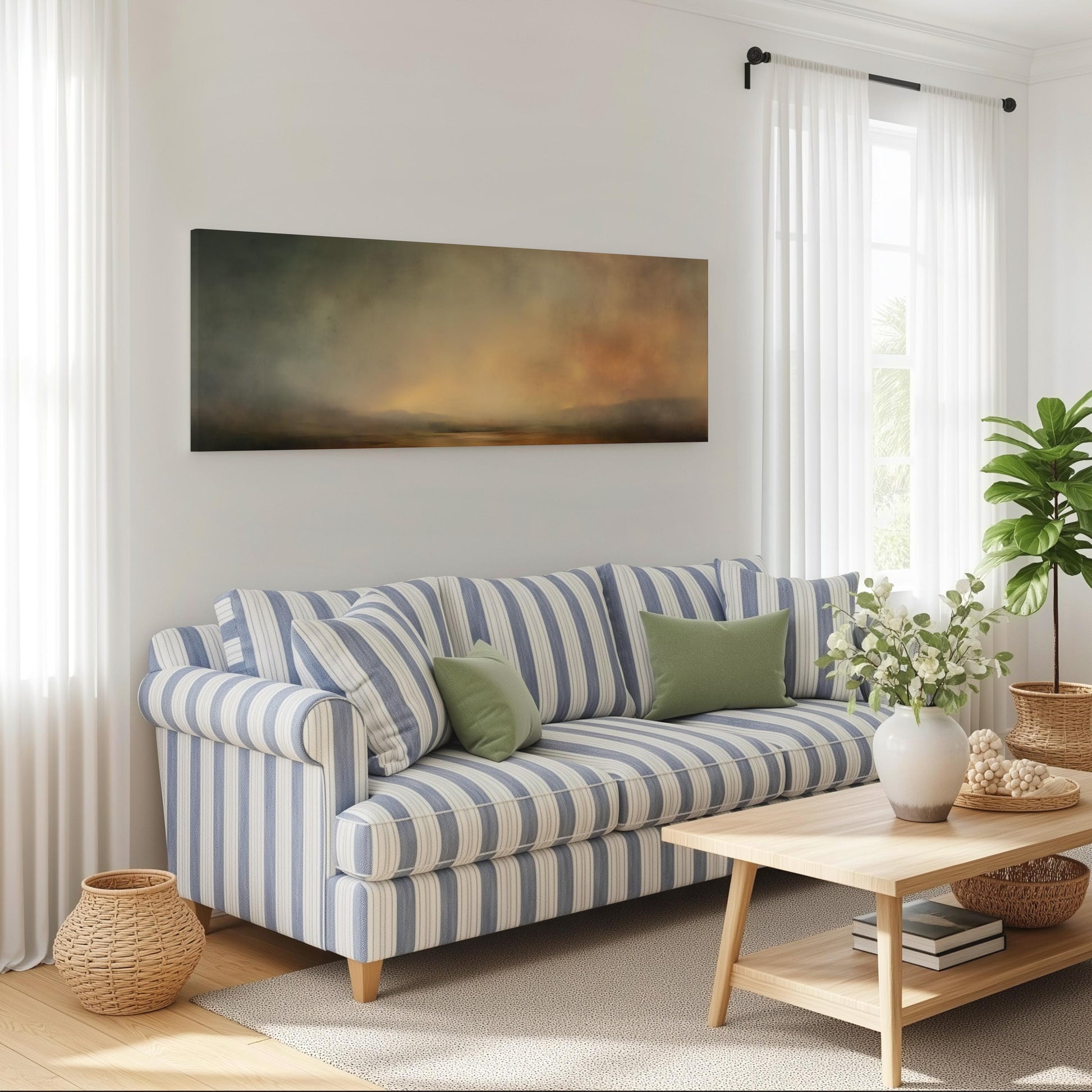 a cozy living room with a striped blue and white sofa, a wooden coffee table, and a large window with white curtains. Above the sofa, there is a painting hanging on the wall. The room also features a potted plant, a basket, and some books, creating a warm and inviting atmosphere.