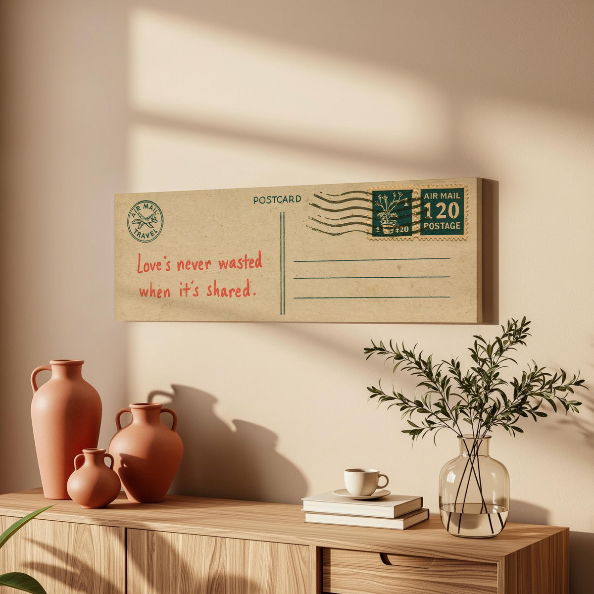 Vintage postcard with a love quote long horizontal canvas print above a wooden sideboard