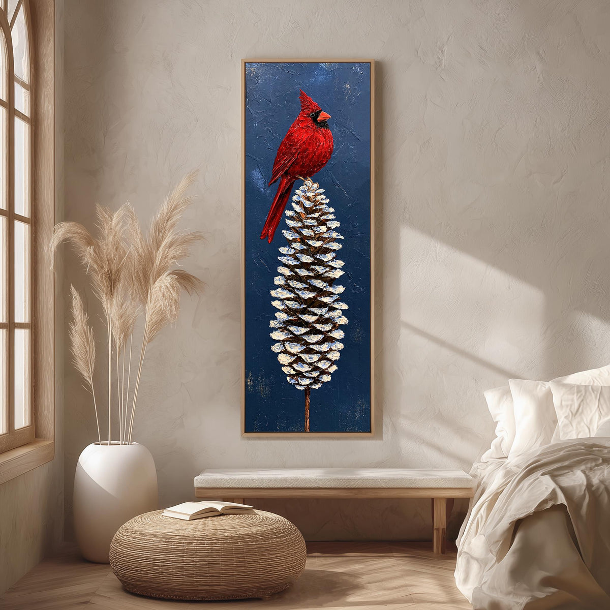 Red cardinal perched on a snowy pinecone long vertical canvas print in a bright reading corner