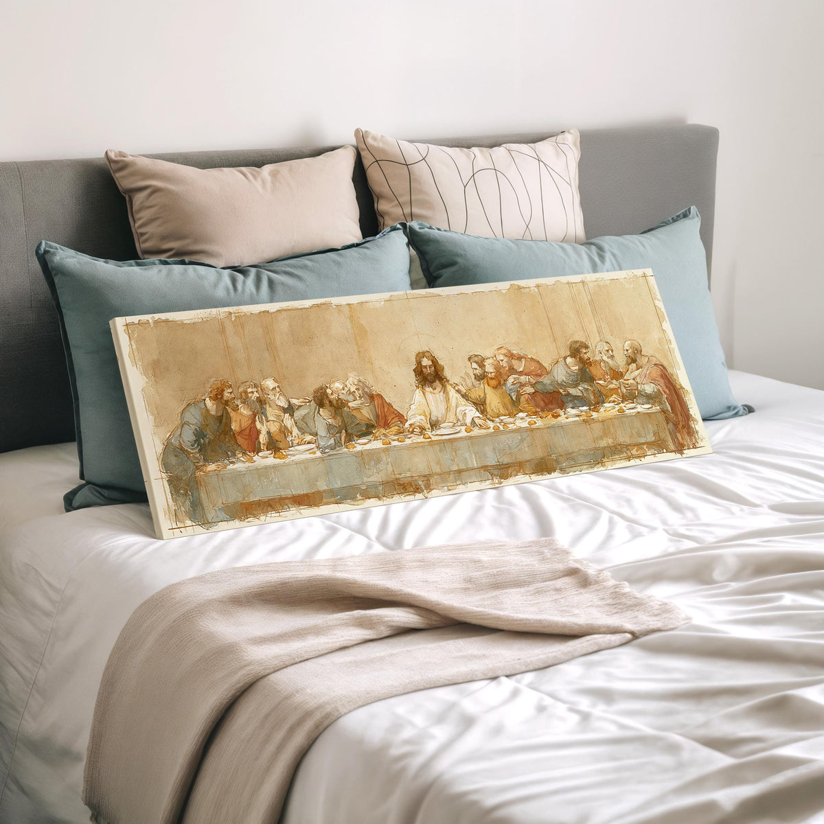 The Last Supper in a sepia sketch style wide panoramic canvas print laid on a bed to show its size