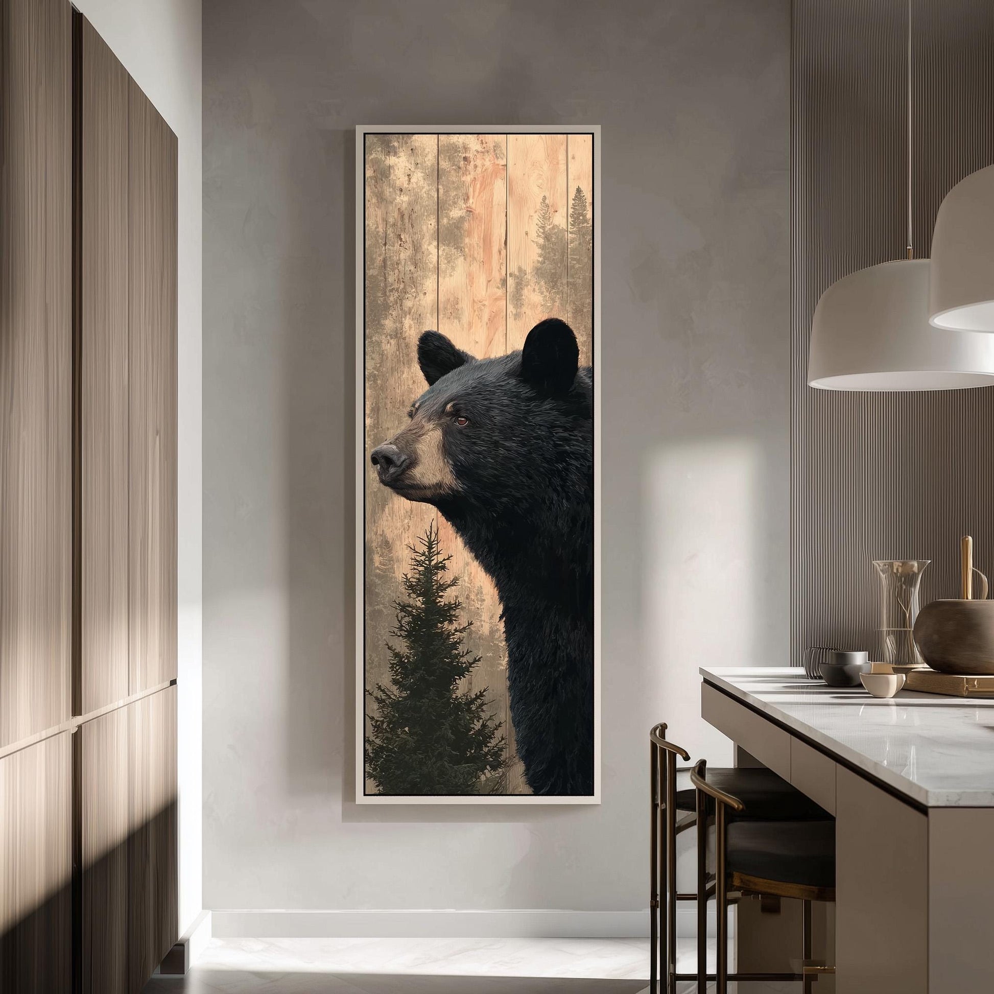 a large framed painting of a black bear in a forest setting, hanging on a wall in a modern kitchen.