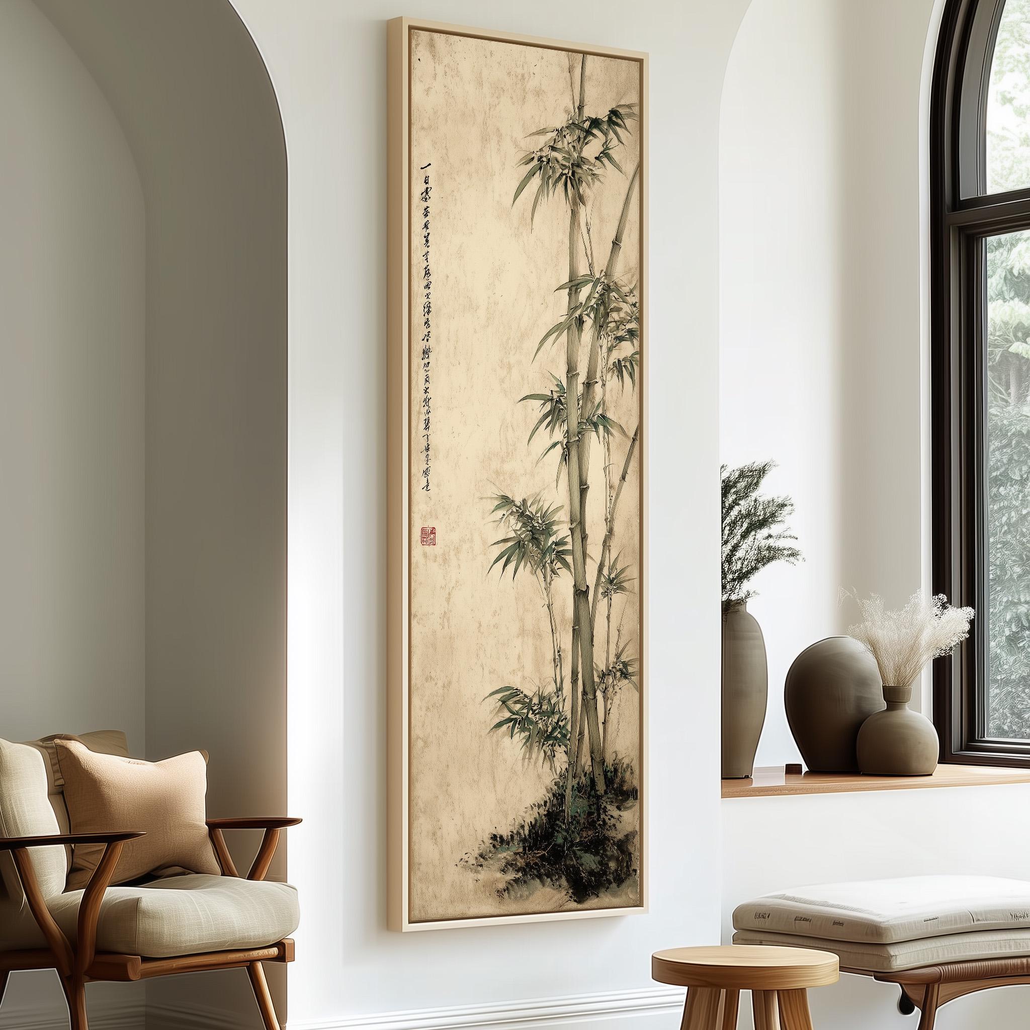a large framed painting of bamboo plants hanging on a wall, with a wooden chair and a small table in the foreground.