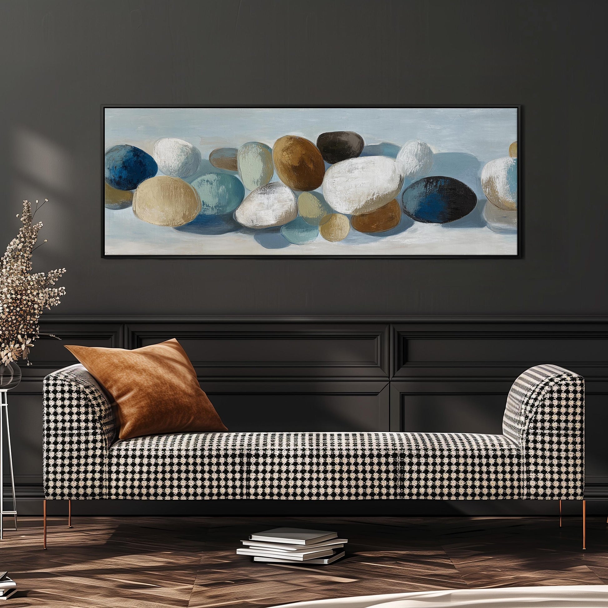 a black and white checkered sofa with a brown throw pillow, set against a dark wall with a large abstract painting hanging above it.