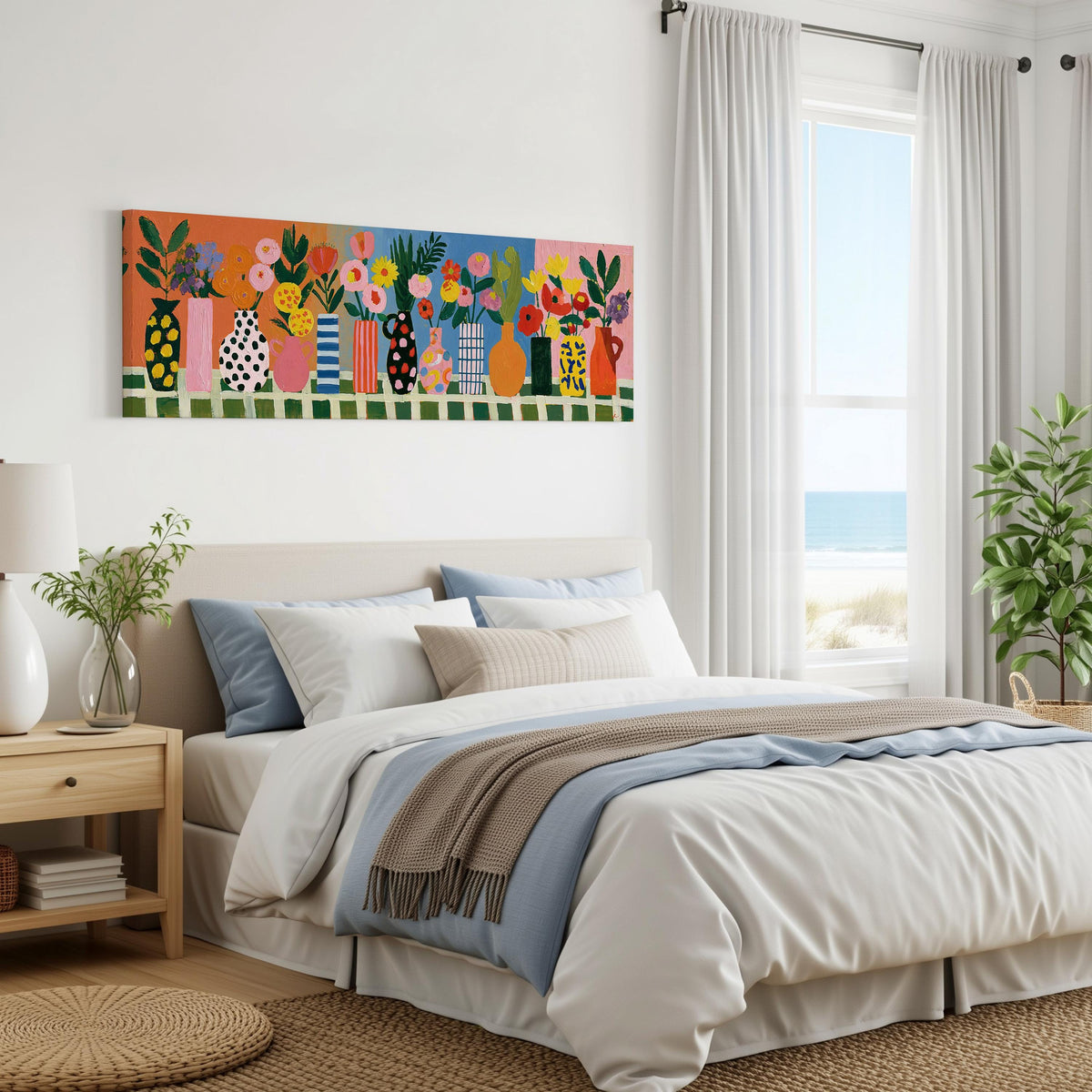 Patterned vases with bright bouquets panoramic canvas print above a bed in a coastal bedroom