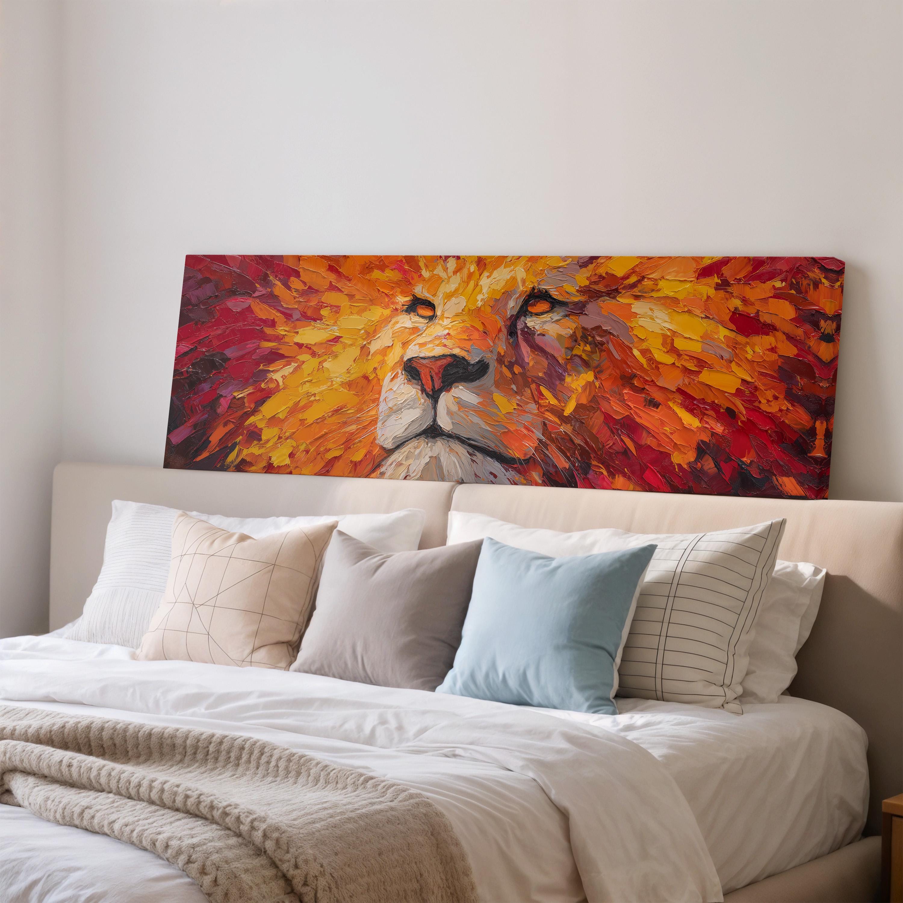 a large, vibrant painting of a lion's face on the wall above a bed with white bedding and pillows.