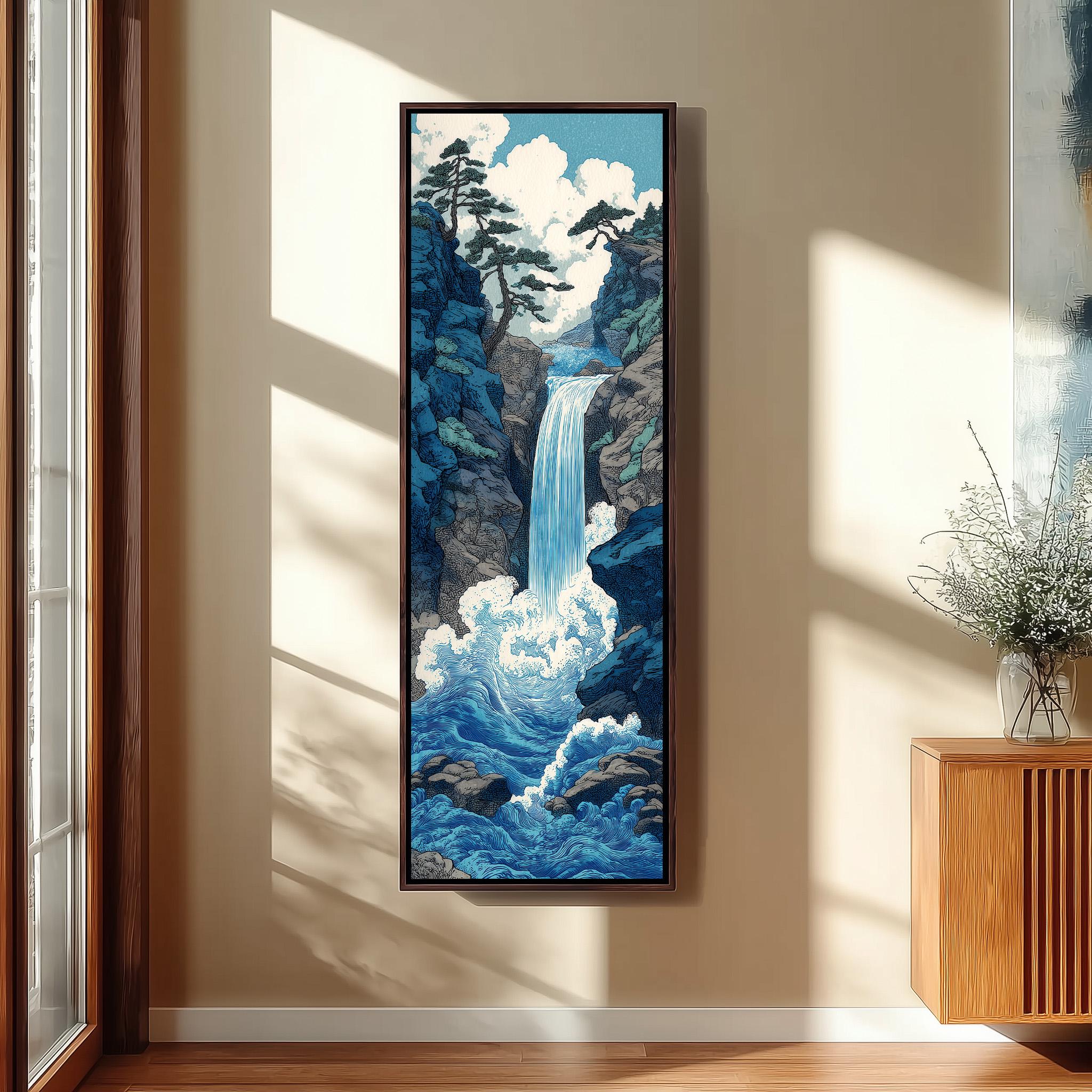 a large framed painting of a waterfall in a serene landscape, hanging on a wall in a room with a wooden cabinet and a vase of flowers.
