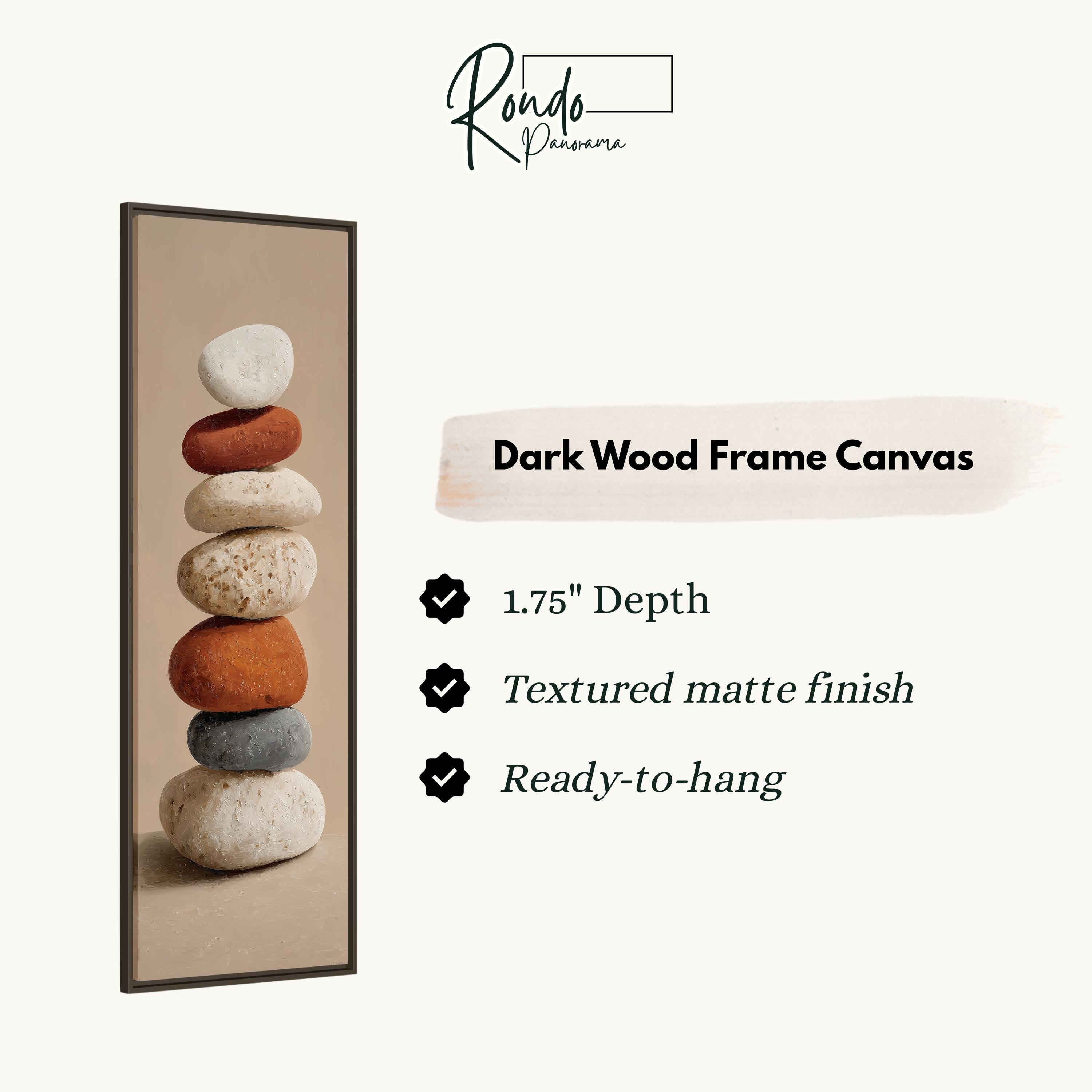 a dark wood frame canvas with a stack of rocks on top of it.