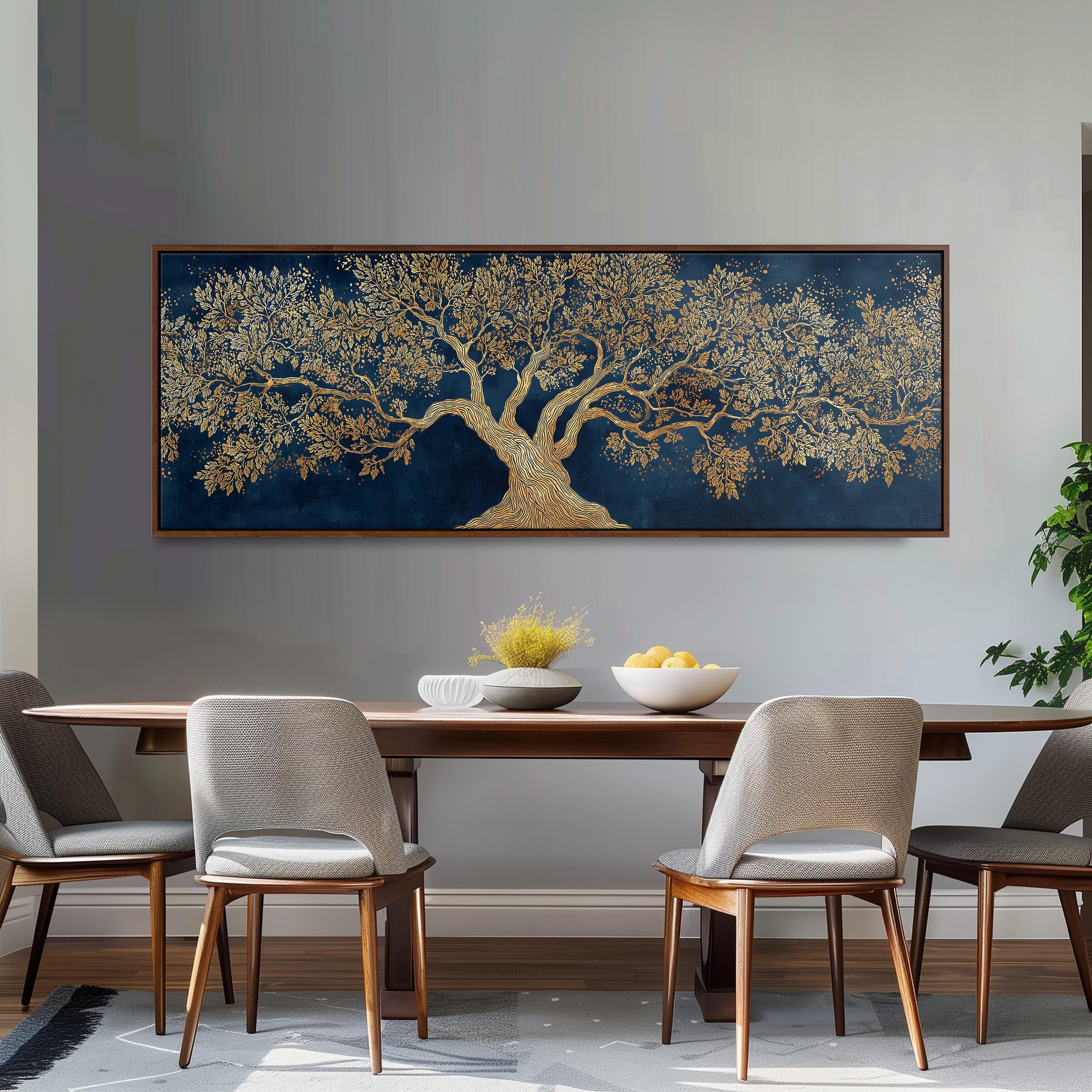 a dining room with a large, ornate tree painting hanging on the wall above a wooden dining table. The table is set with a bowl of fruit and a vase of flowers, creating a warm and inviting atmosphere. The room is furnished with four chairs, two on each side of the table, and a potted plant is visible on the right side of the room.
