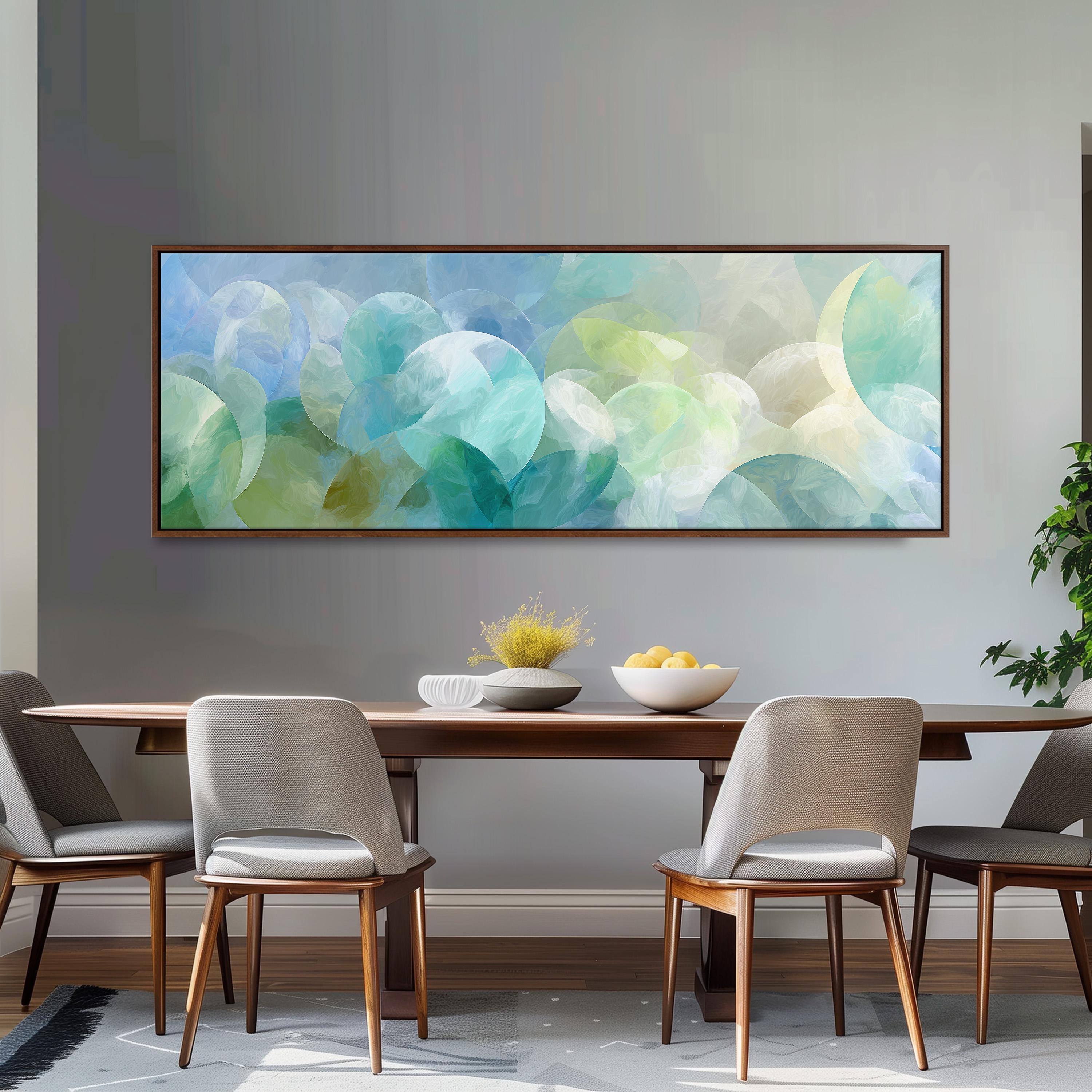 a dining room with a large abstract painting hanging on the wall above a wooden table with four chairs. The painting has a blue and green color scheme, creating a calming and modern atmosphere in the room.