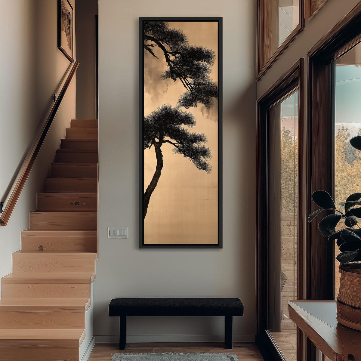 Pine branch silhouette on gold tall narrow canvas print beside a staircase in an entryway