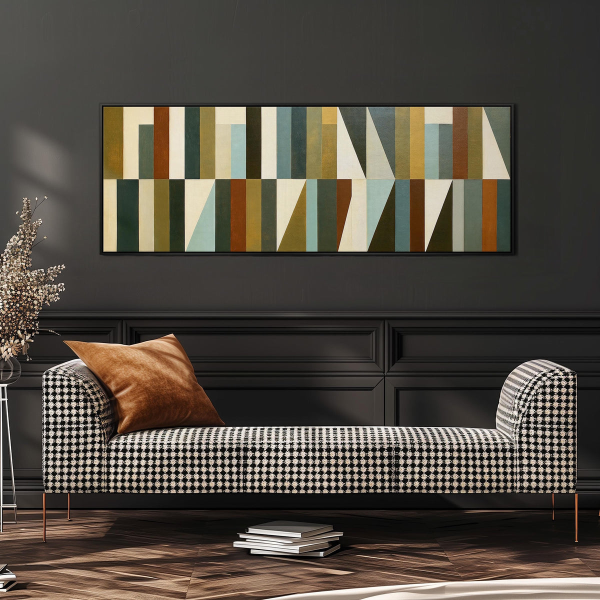 Earth tone geometric triangles wide panoramic canvas print above a bench in a dark living room
