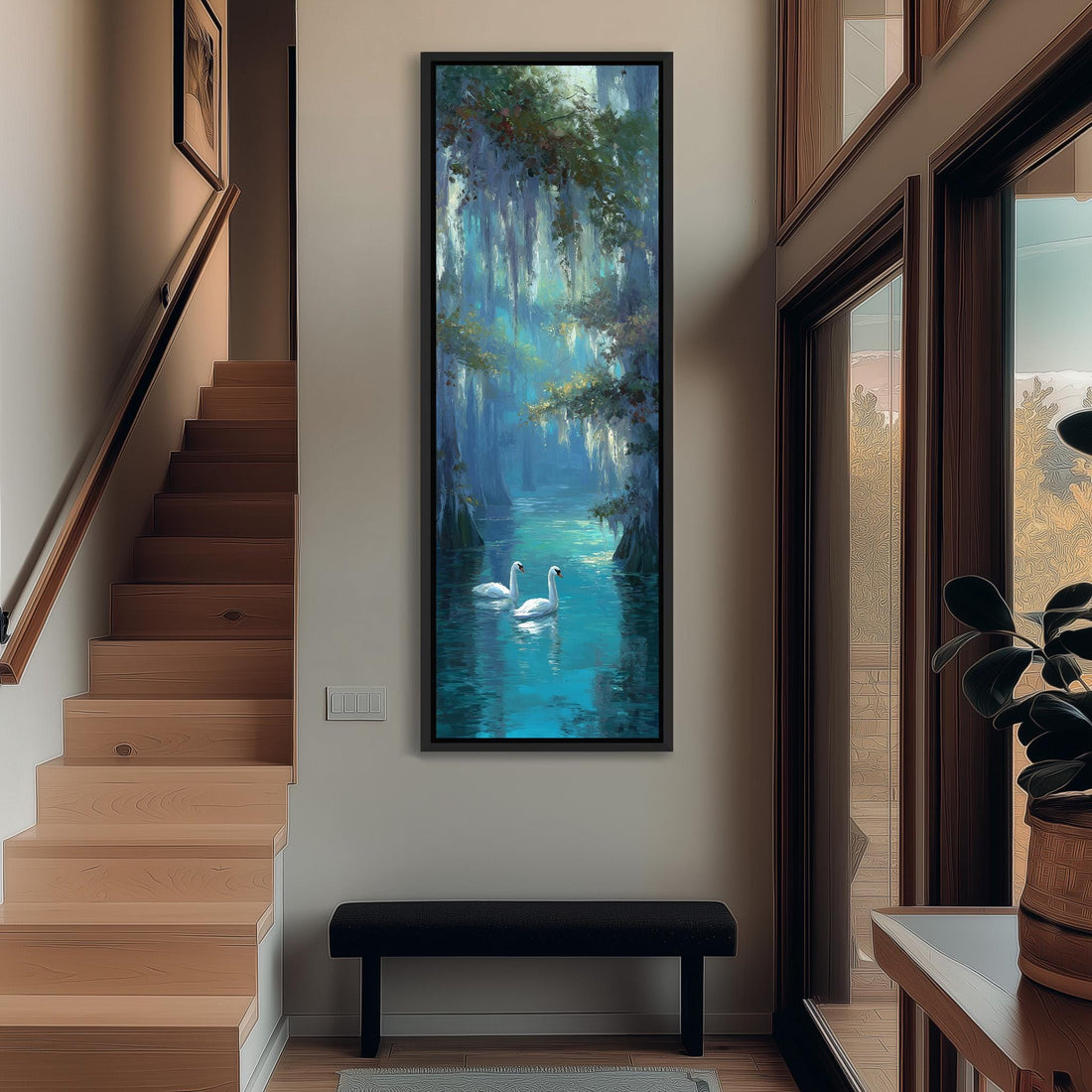 a large painting of two swans swimming in a blue-green body of water, hanging on a wall in a room with a wooden floor and a window.