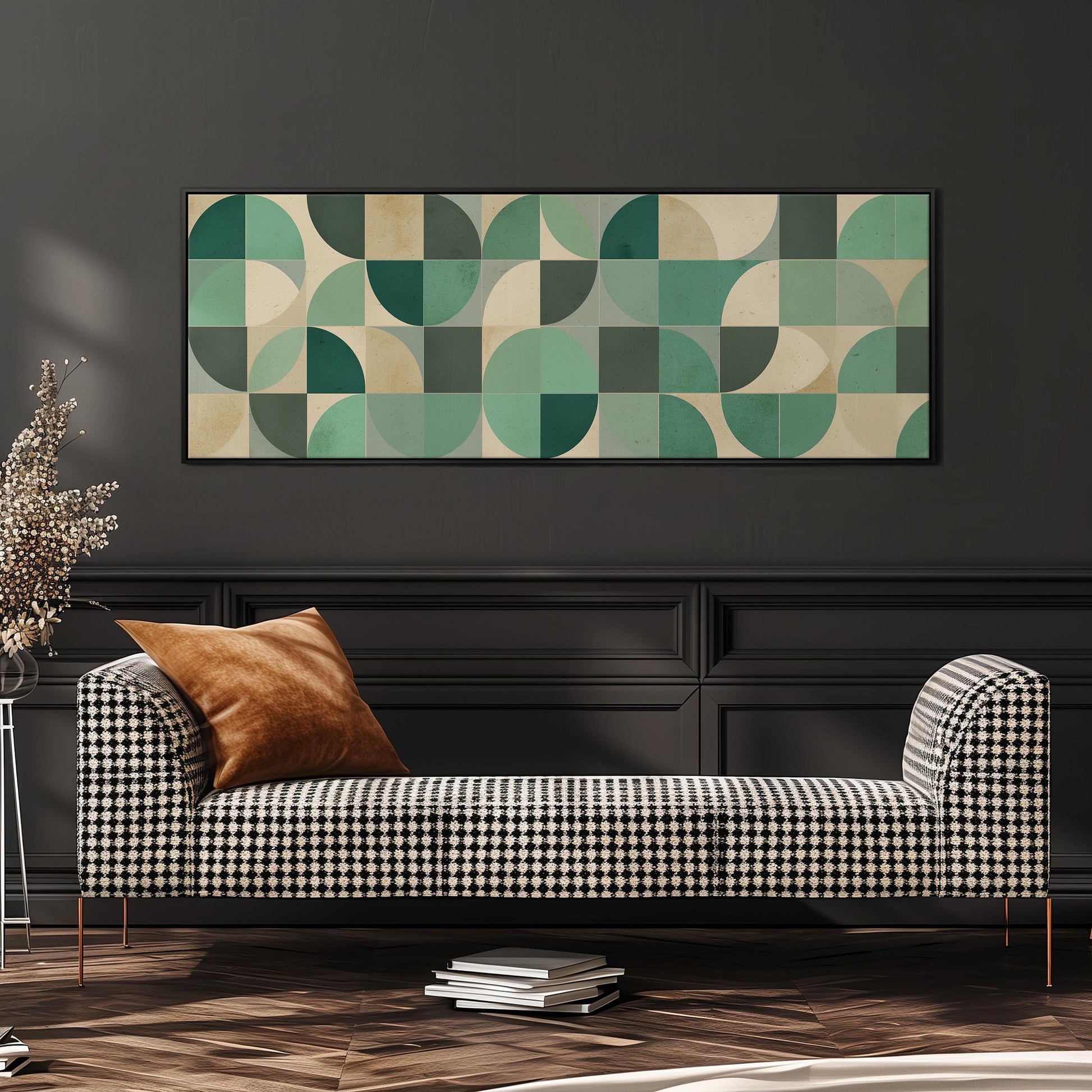 a modern living room with a black and white checkered sofa, a large abstract painting on the wall, and a stack of books on the floor.