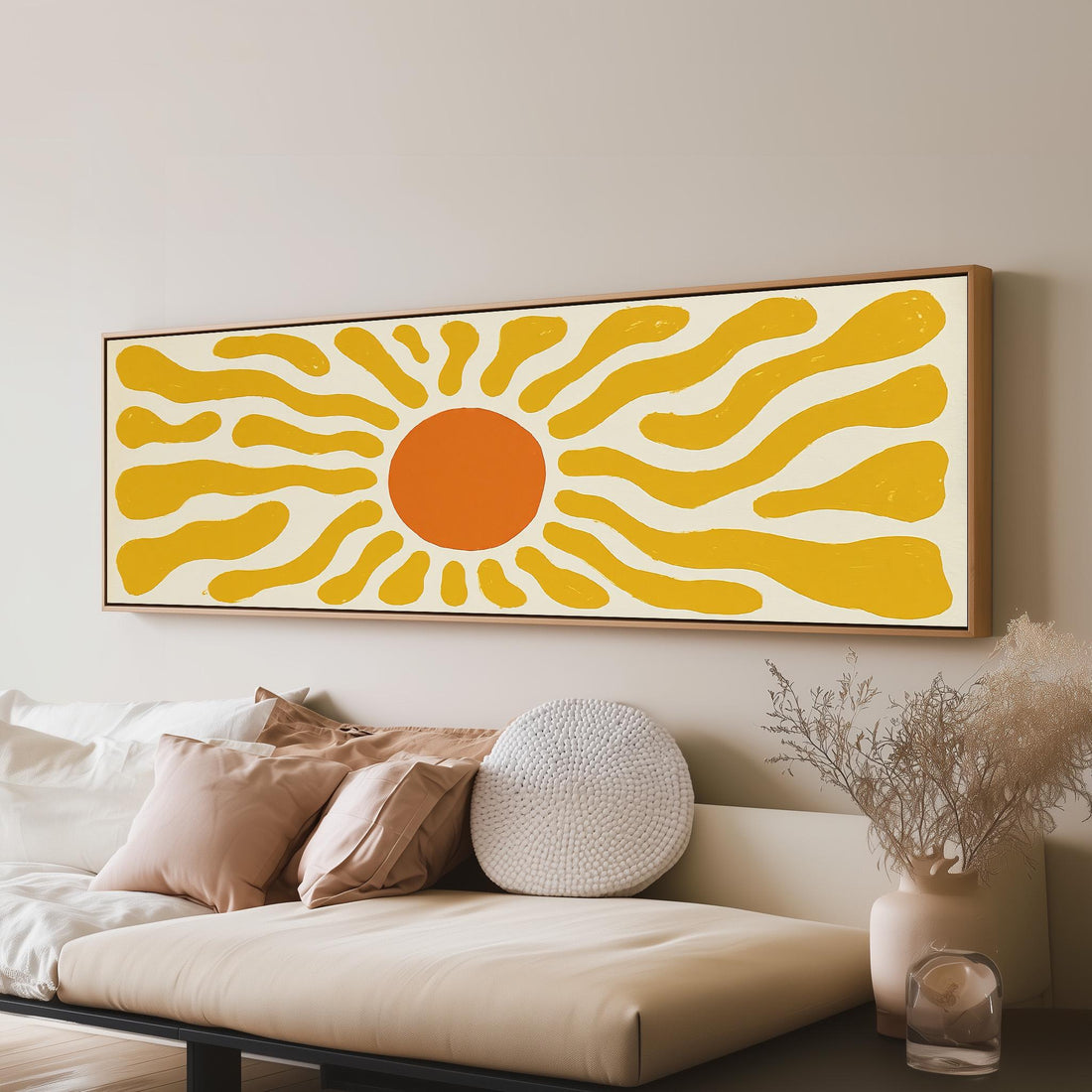 Retro orange sunburst long horizontal canvas print above a sofa in a living room