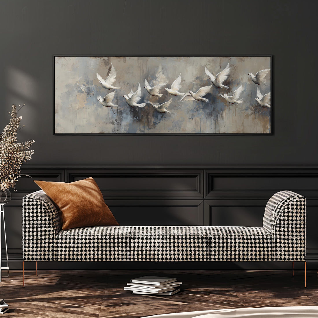 a large painting of a flock of white birds in flight, hanging on a wall above a white sofa with gray and white patterned throw pillows.