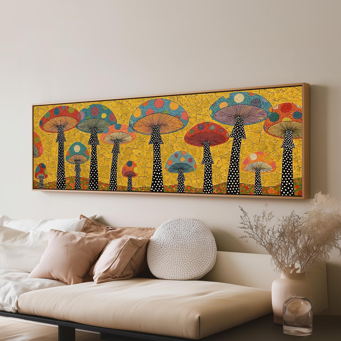 Polka dot mushrooms on gold long horizontal canvas print above a sofa in a living room