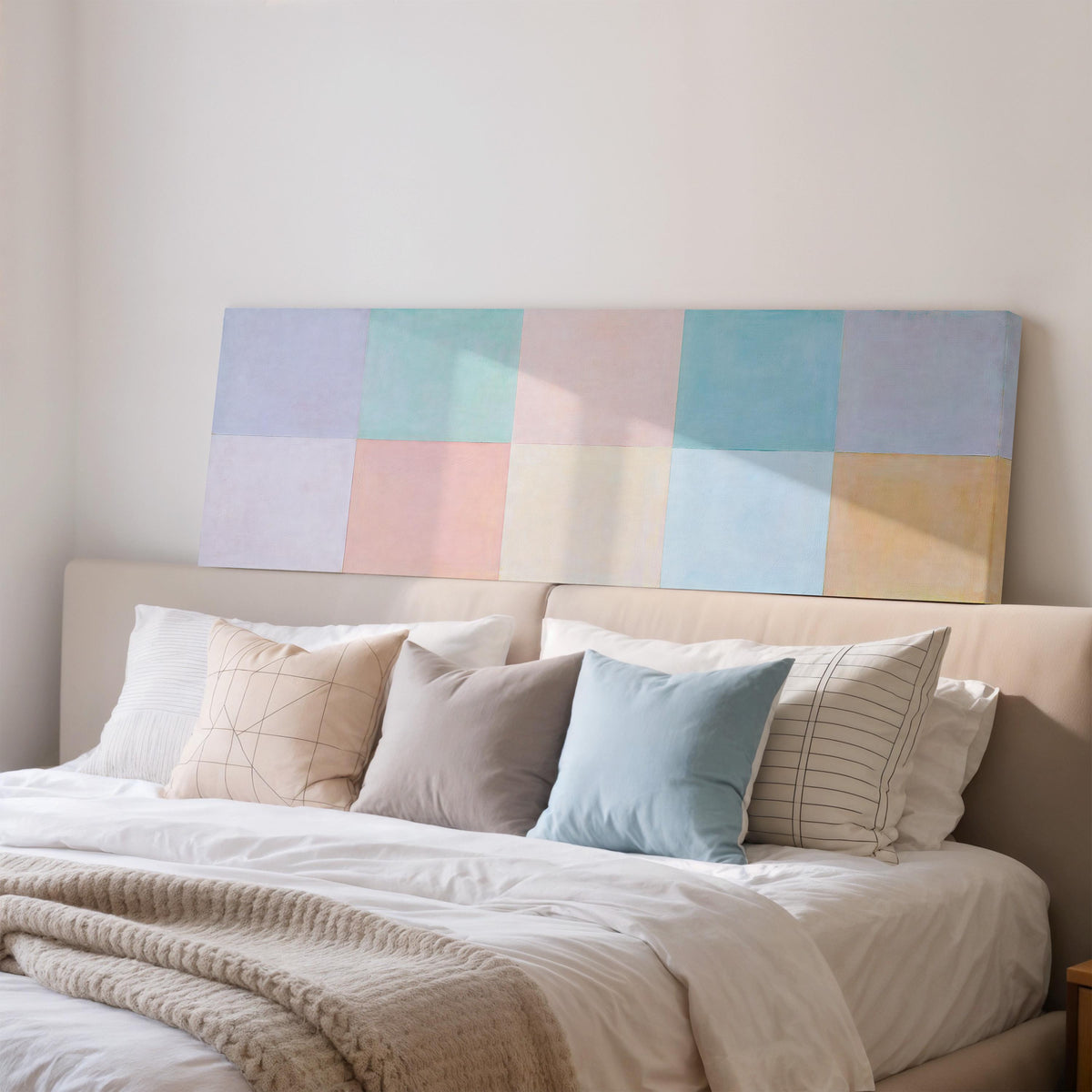 Pastel checkerboard grid wide panoramic canvas print above a bed in a bedroom
