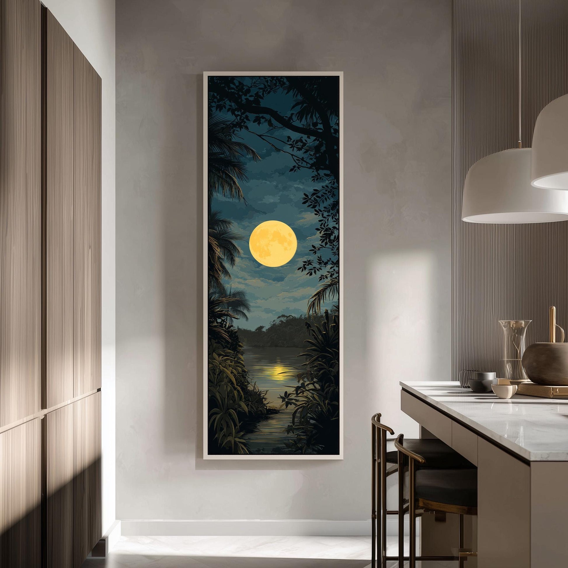 a large, framed painting of a tropical landscape with a full moon in the sky, hanging on a wall in a modern kitchen.