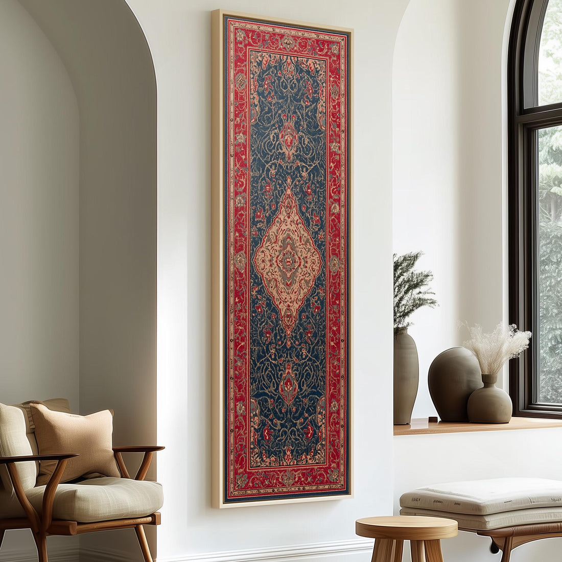 a large, ornate rug hanging on a wall in a room with a wooden cabinet and a vase of flowers.