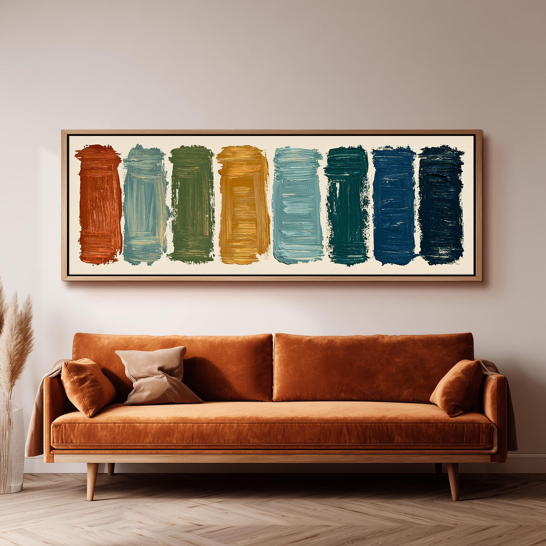 Bold brushstroke color swatches long horizontal canvas print above a sofa in a living room
