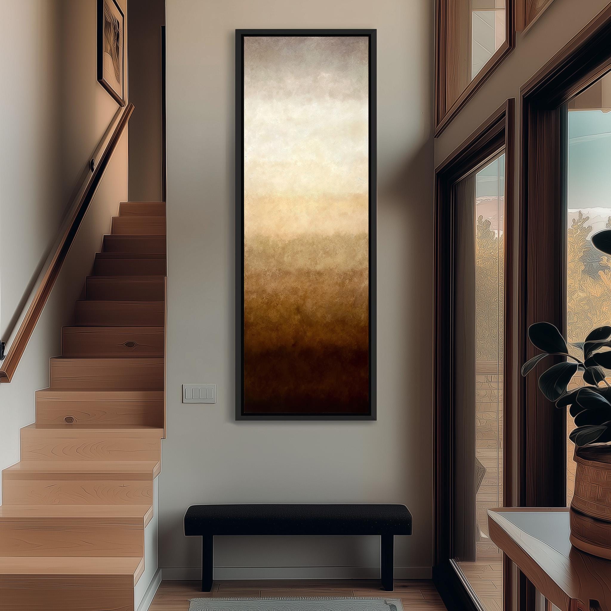 a modern and minimalist interior design, featuring a large abstract painting hanging on the wall, a wooden staircase, a black bench, and a large window that allows natural light to enter the space.