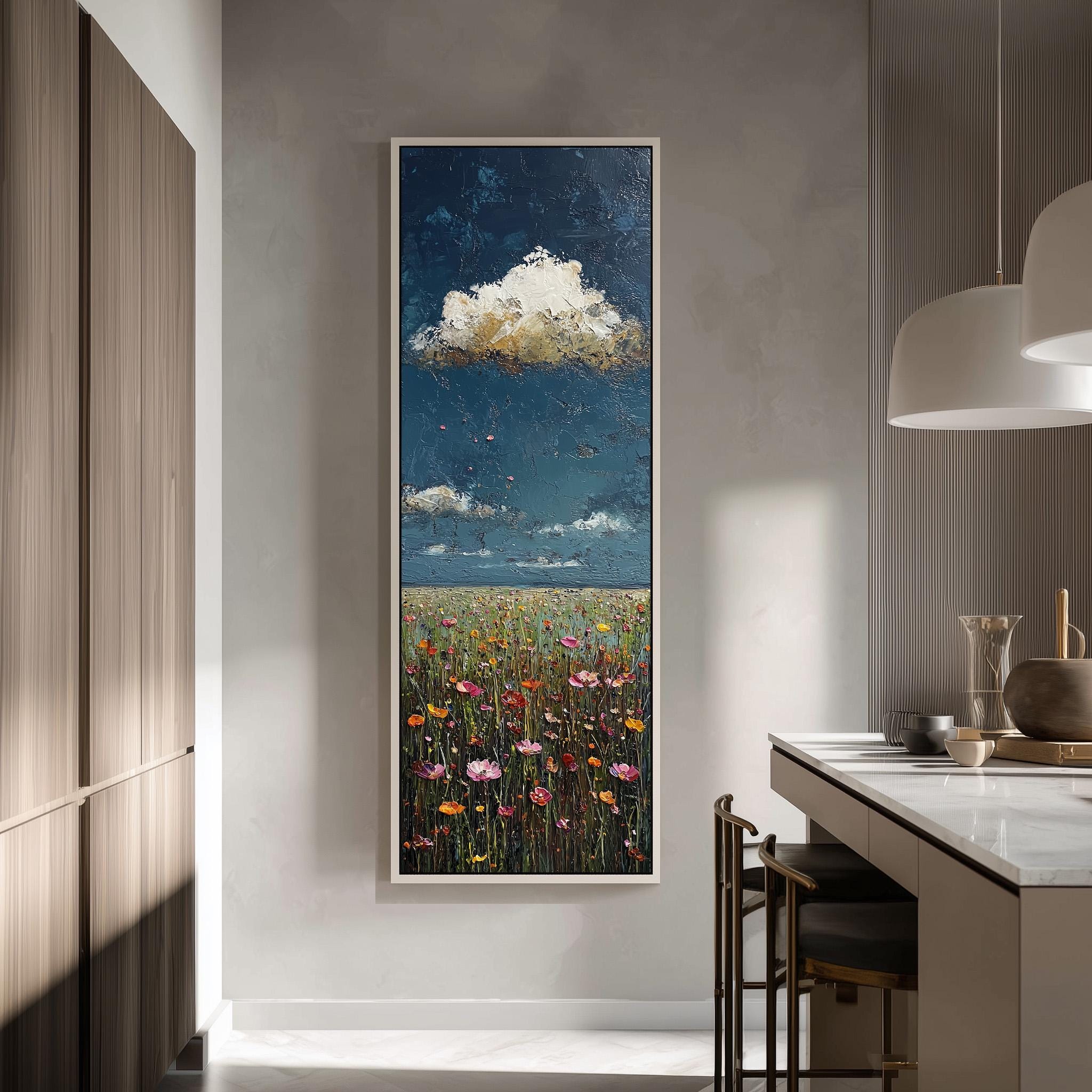 a large painting of a field of flowers hanging on a wall in a modern kitchen.