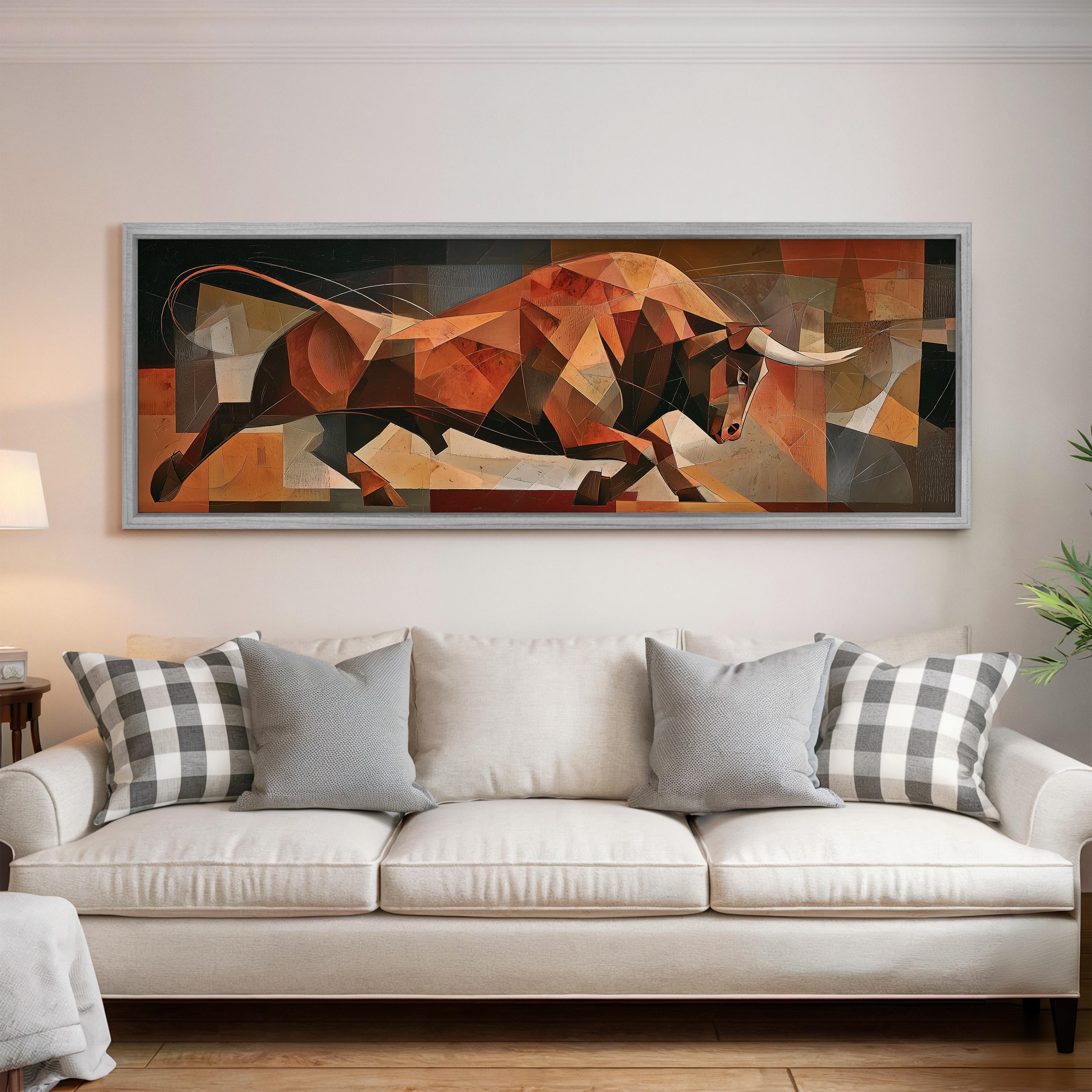a large abstract painting of a bull on a white couch in a living room setting.