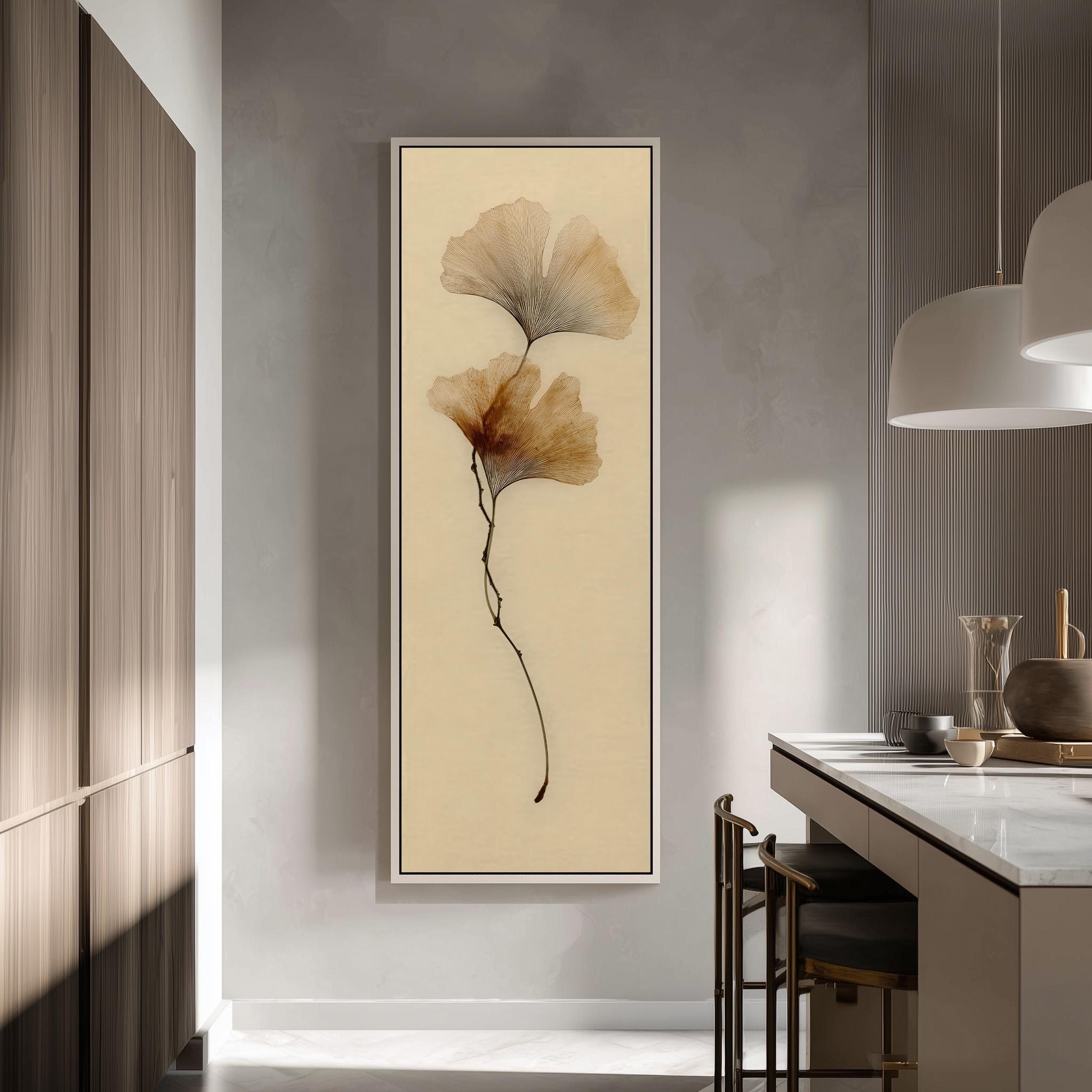 a modern kitchen with a large framed artwork of a ginkgo tree on the wall.