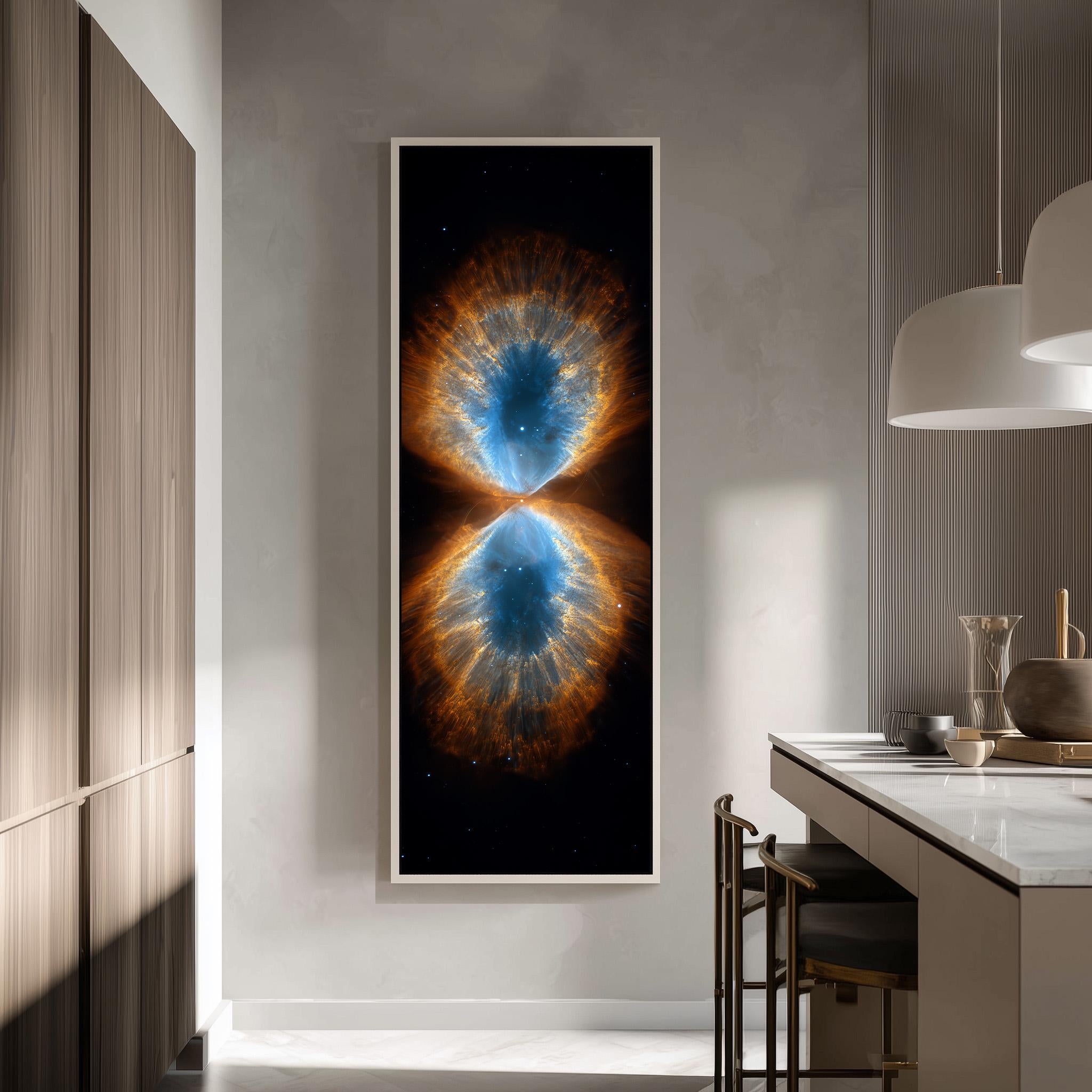 a large framed artwork depicting a vibrant, colorful nebula or supernova, hanging on a wall in a modern kitchen.