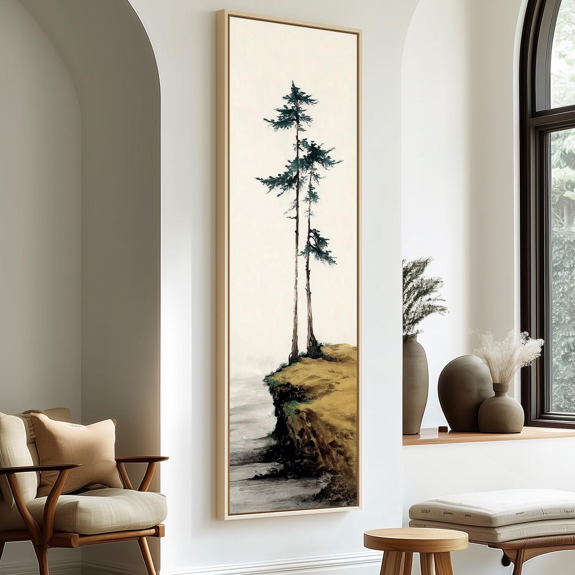 a large painting of a tree on a wall, with a wooden chair and a small table in the foreground.