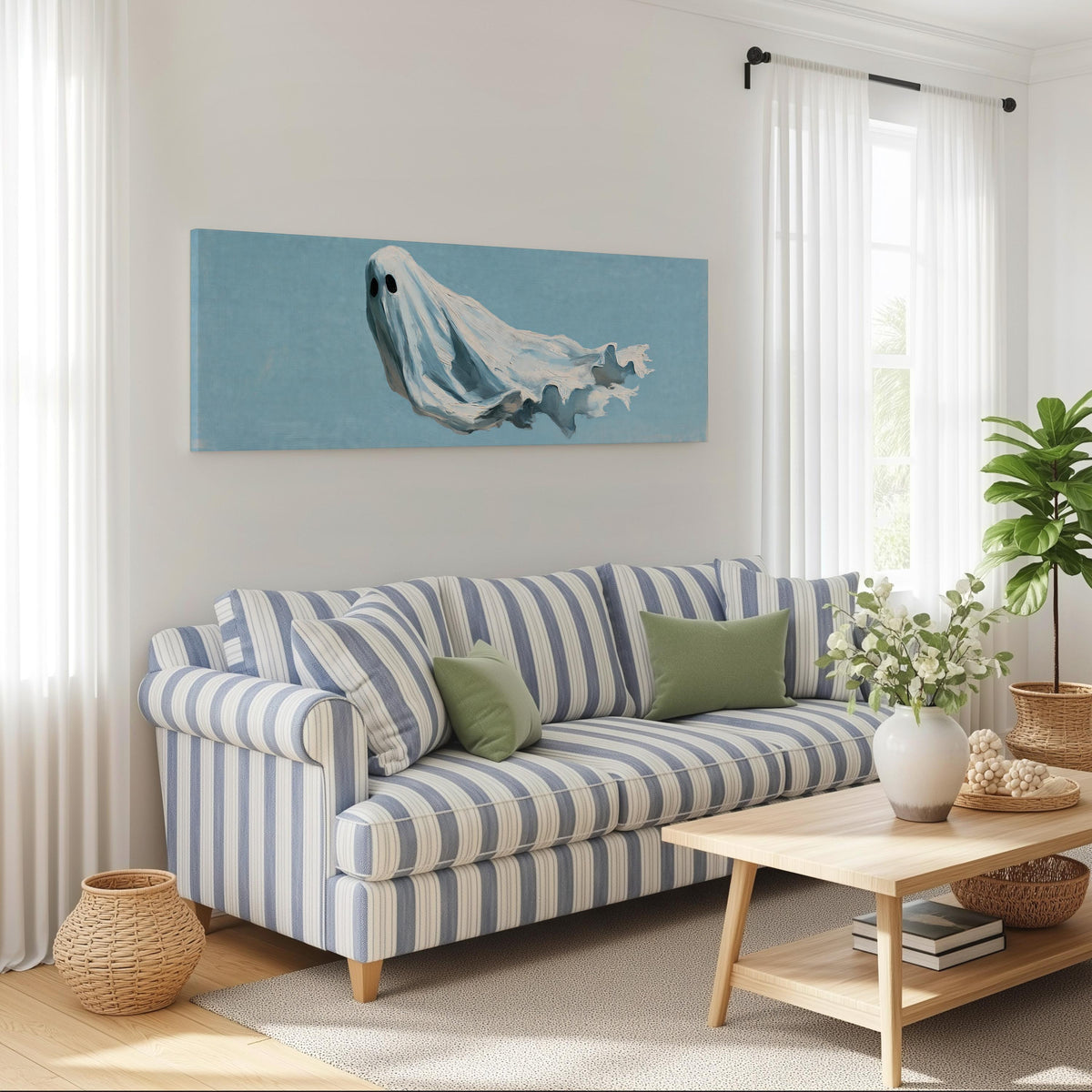 Drifting ghost spirit long horizontal canvas print above a striped sofa in a coastal living room