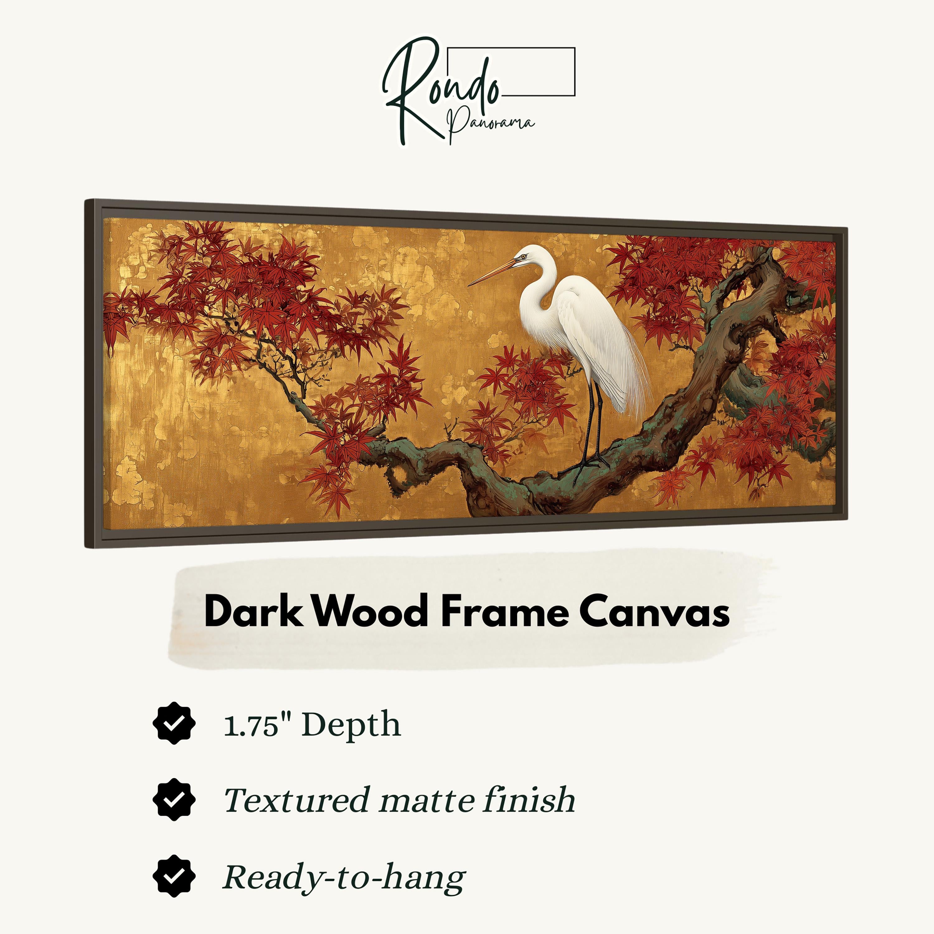 The image is a framed artwork depicting a white crane standing on a branch with red leaves, set against a golden background.