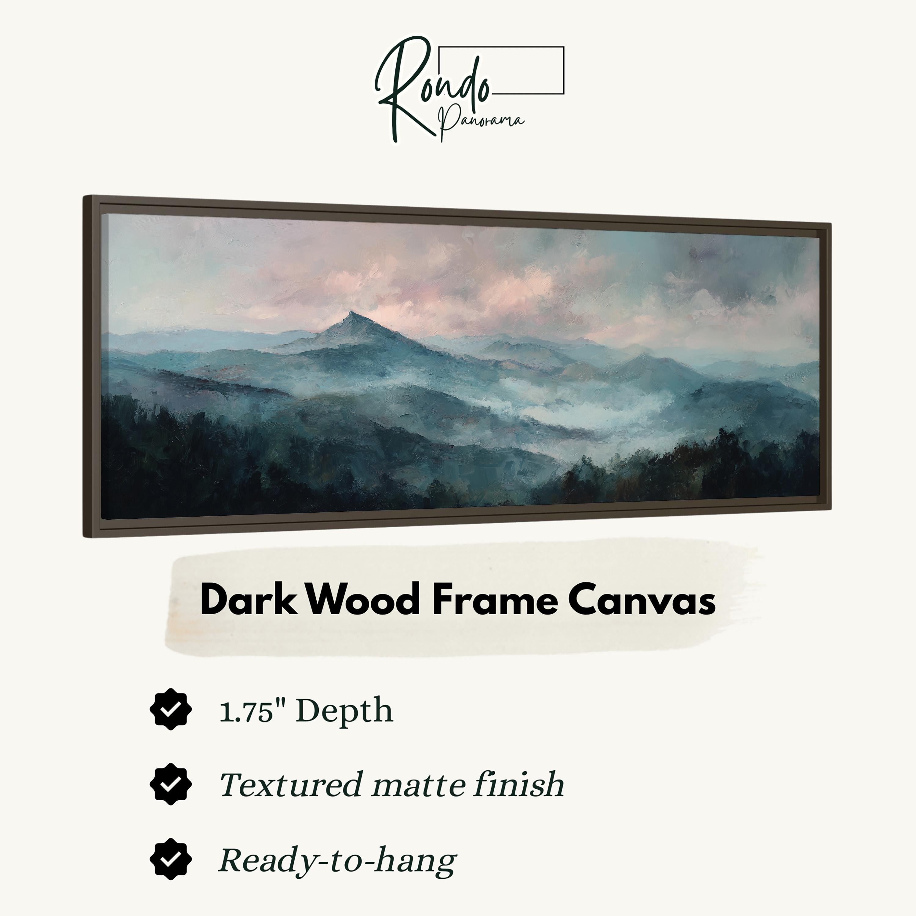 The image is a framed artwork depicting a mountainous landscape with a hazy, misty atmosphere.