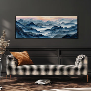 a large, framed landscape painting hanging on a wall above a black and white checkered sofa in a living room setting.