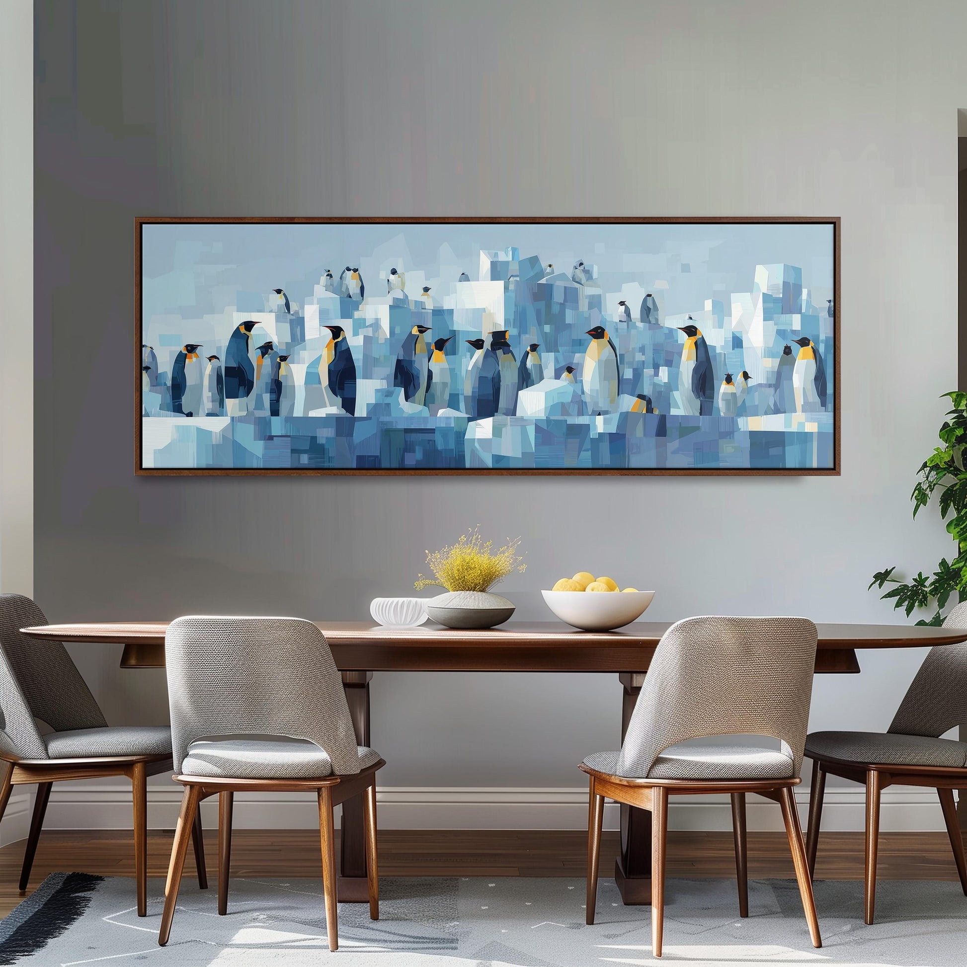 a large painting of penguins on a wall above a wooden dining table with four chairs.