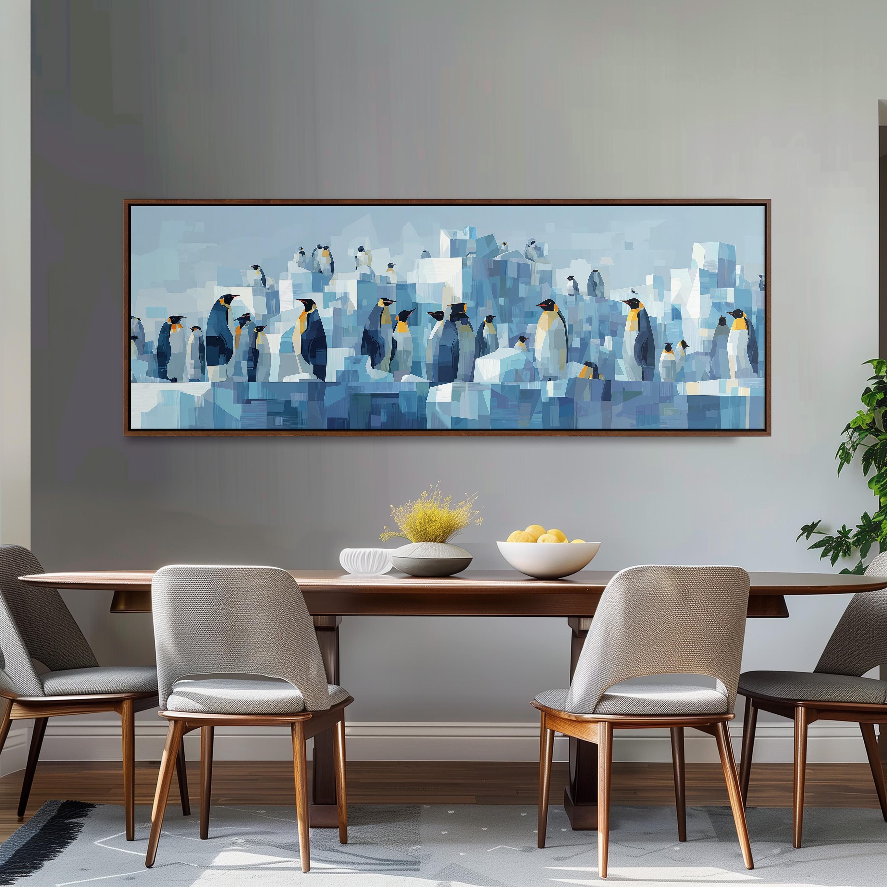 a large painting of penguins on a wall above a wooden dining table with four chairs.