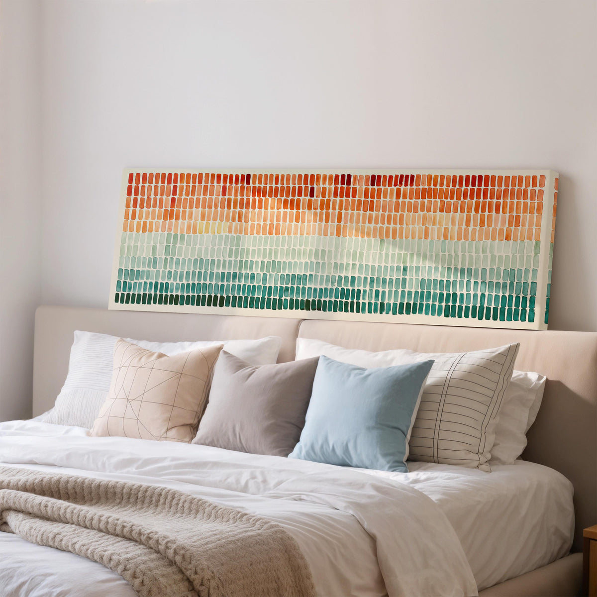 Brushmarks fading from orange to teal wide panoramic canvas print above a bed in a bedroom