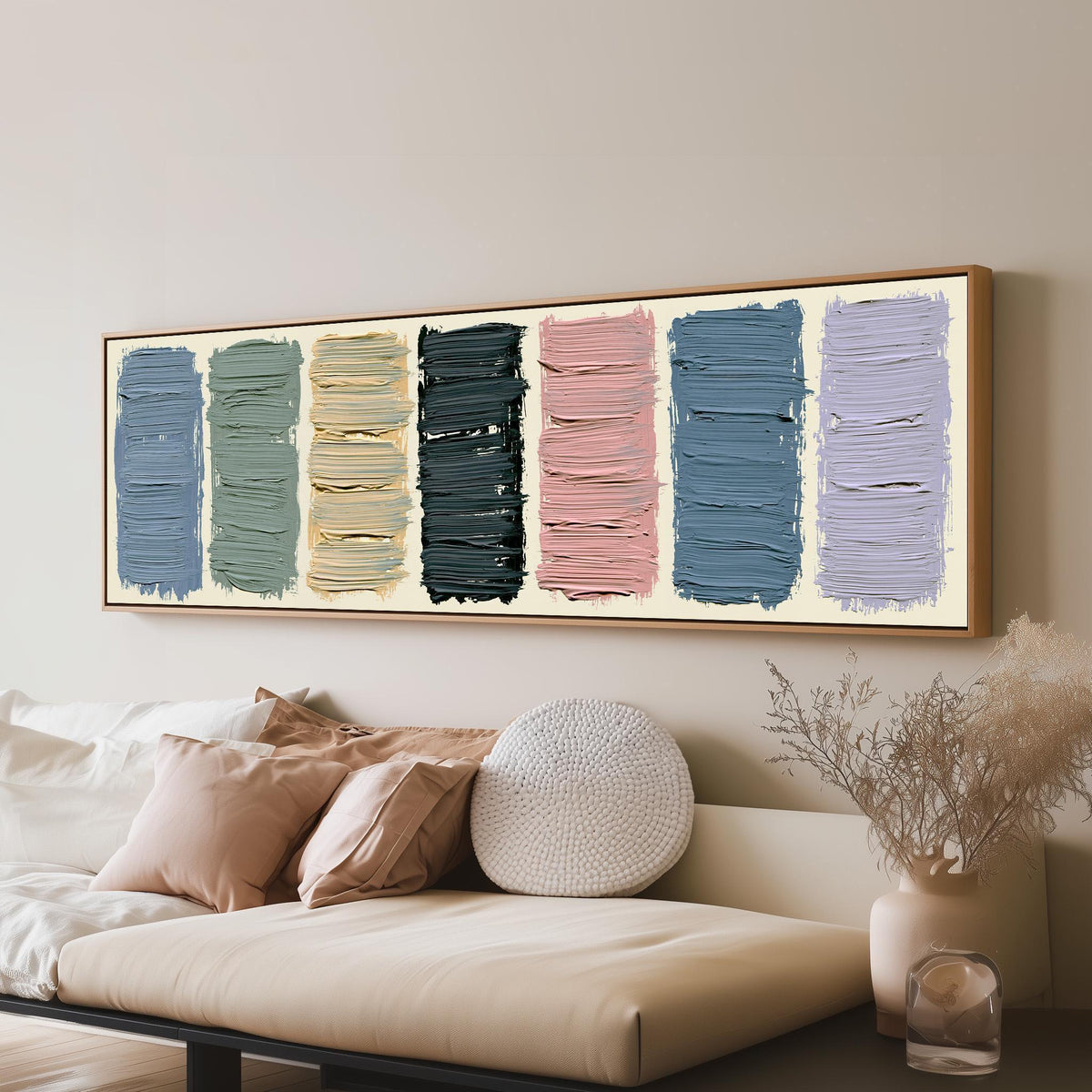 Pastel brushstroke color swatches long horizontal canvas print above a sofa in a living room