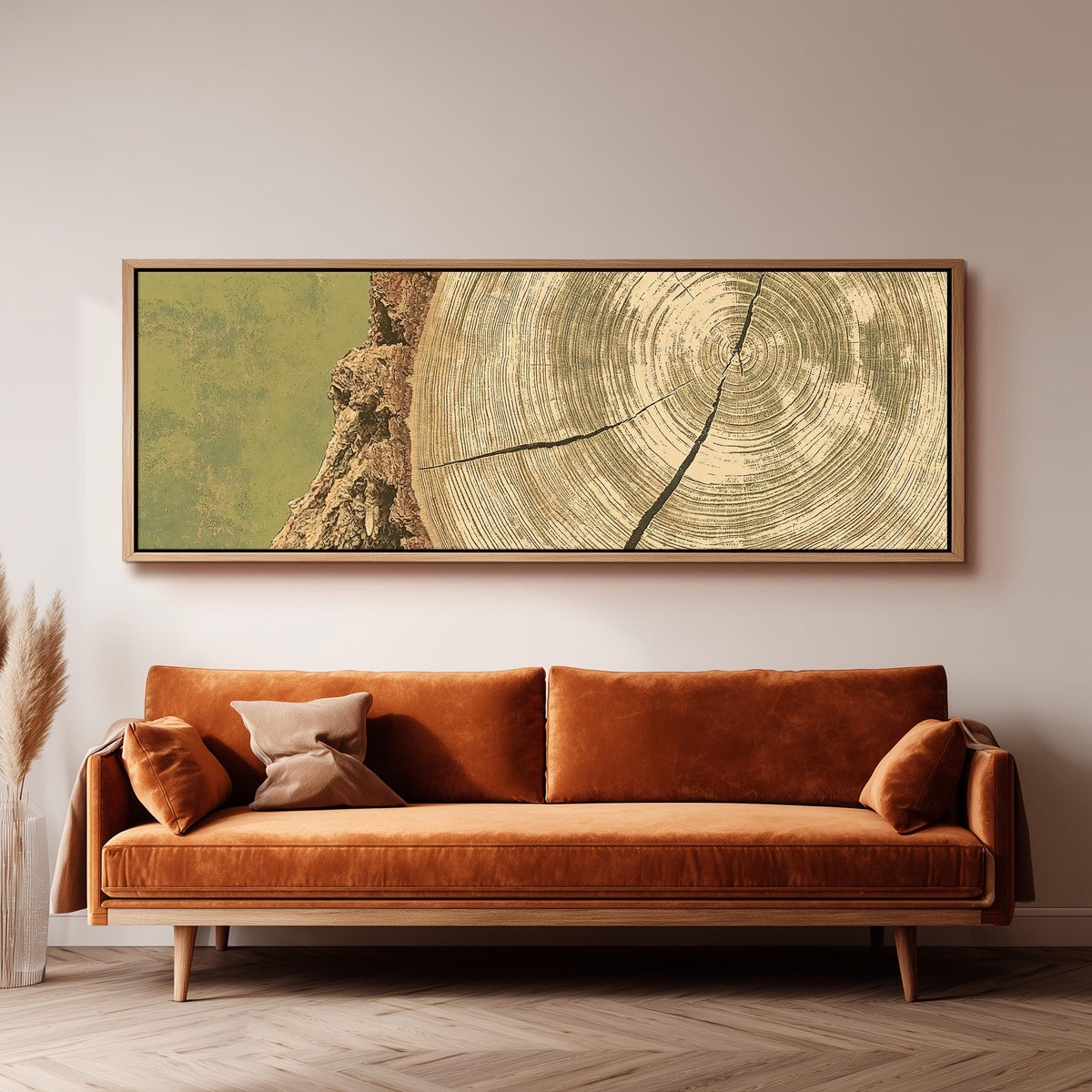 Golden tree ring wood grain panoramic canvas print above a sofa in a living room