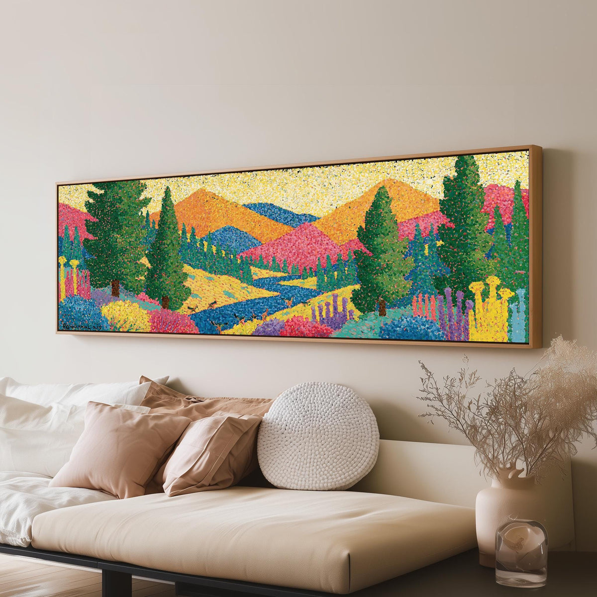 Colorful pine mountain valley panoramic canvas print above a sofa in a living room