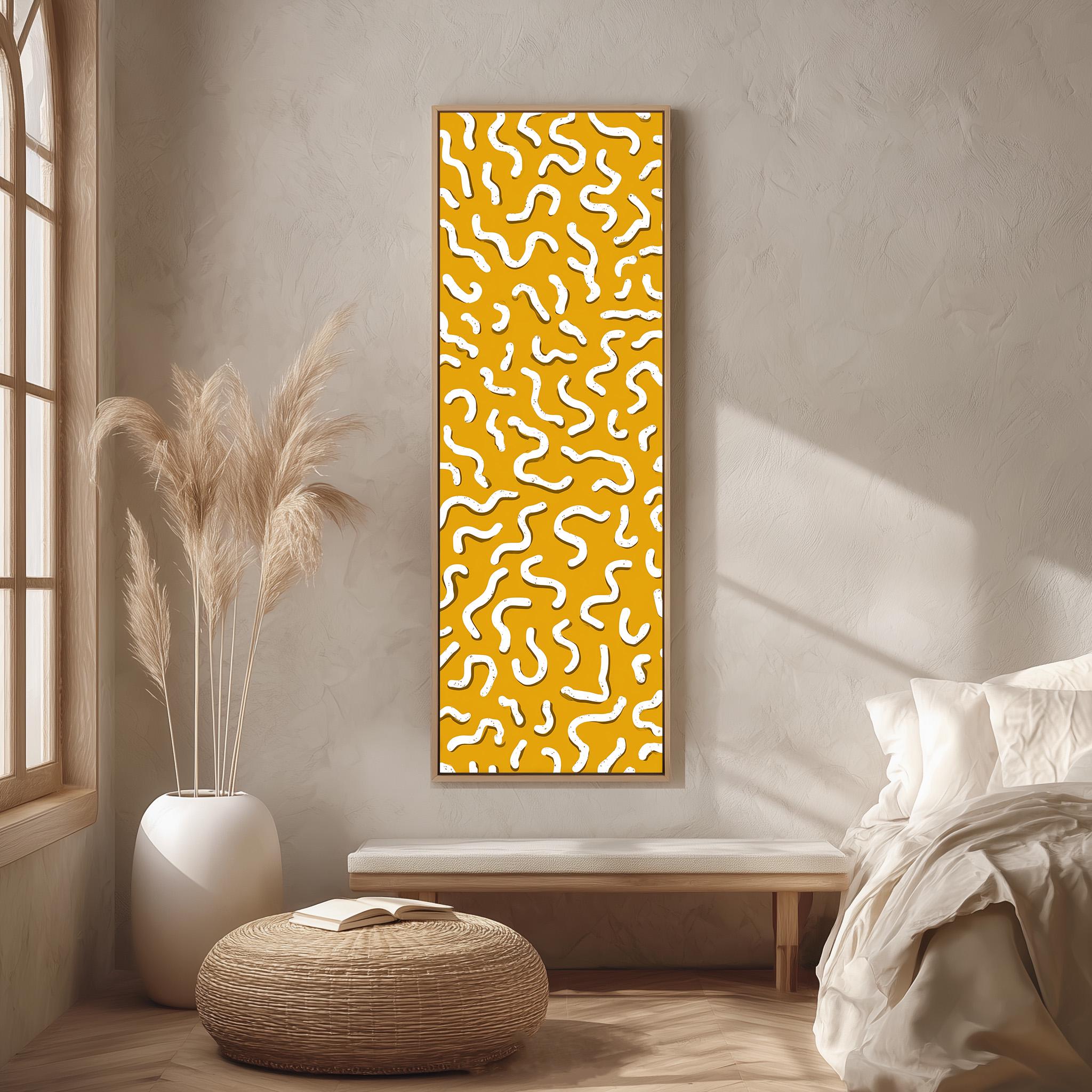 a modern bedroom with a large abstract painting featuring a yellow and white pattern hanging on the wall. The room has a minimalist design, with a bed, a white ottoman, and a potted plant.