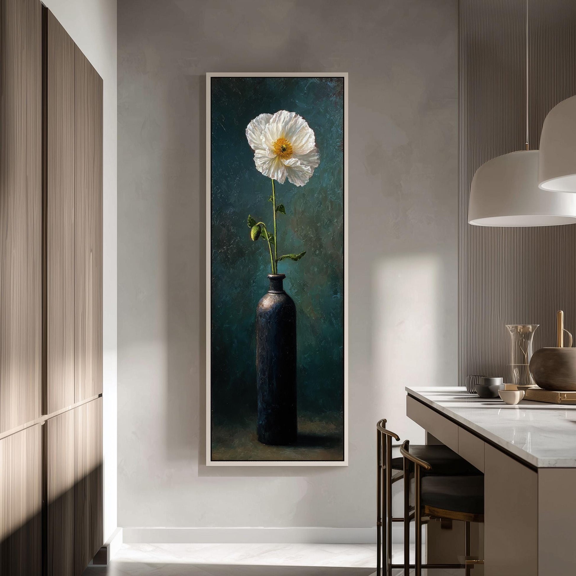 a large painting of a white flower in a black vase hanging on a wall in a modern kitchen.