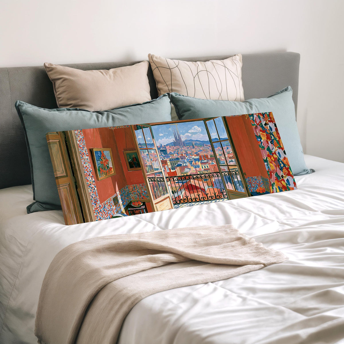 Barcelona seen through an open window wide panoramic canvas print laid on a bed to show its size